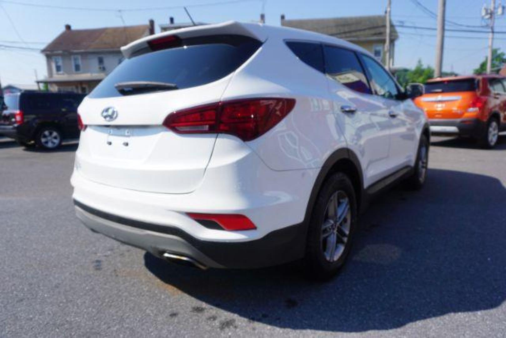 2018 Pearl White /Beige, cloth Hyundai Santa Fe Sport 2.4 AWD (5NMZTDLB1JH) with an 2.4L L4 DOHC 16V engine, 6-Speed Automatic transmission, located at 312 Centre Ave, Schuylkill Haven, PA, 17972, (570) 593-5278, 40.638130, -76.177383 - Brand New factory engine - Photo#9