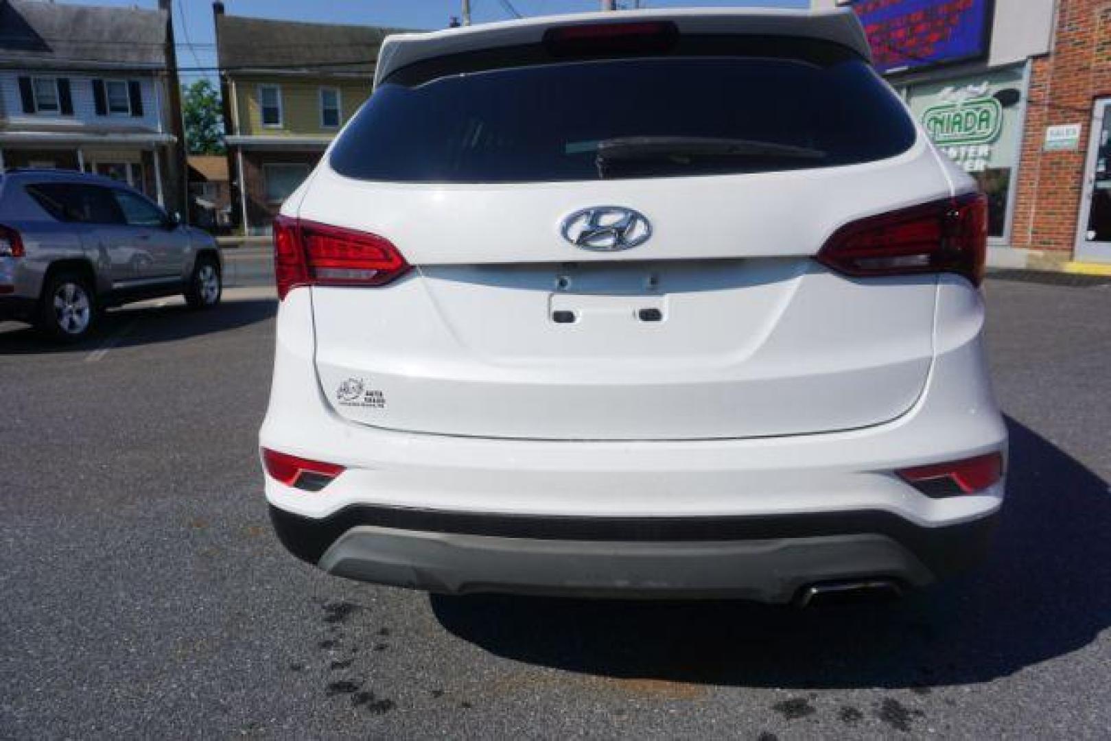 2018 Pearl White /Beige, cloth Hyundai Santa Fe Sport 2.4 AWD (5NMZTDLB1JH) with an 2.4L L4 DOHC 16V engine, 6-Speed Automatic transmission, located at 312 Centre Ave, Schuylkill Haven, PA, 17972, (570) 593-5278, 40.638130, -76.177383 - Brand New factory engine - Photo#10