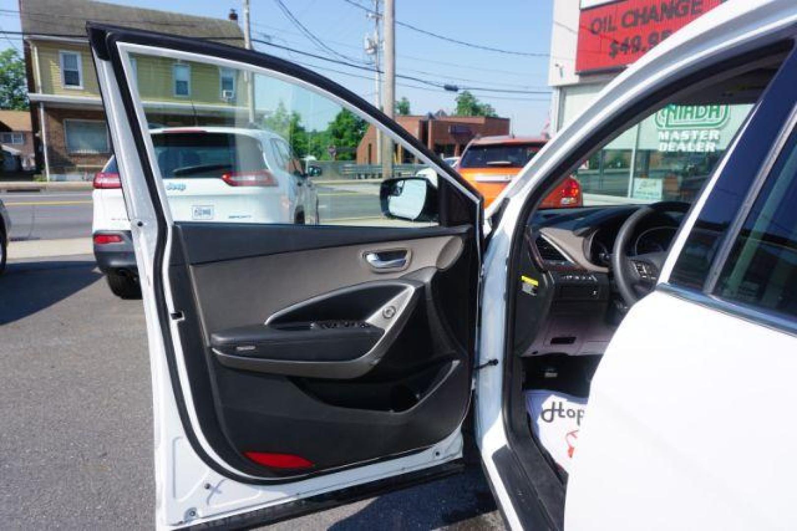 2018 Pearl White /Beige, cloth Hyundai Santa Fe Sport 2.4 AWD (5NMZTDLB1JH) with an 2.4L L4 DOHC 16V engine, 6-Speed Automatic transmission, located at 312 Centre Ave, Schuylkill Haven, PA, 17972, (570) 593-5278, 40.638130, -76.177383 - Brand New factory engine - Photo#12