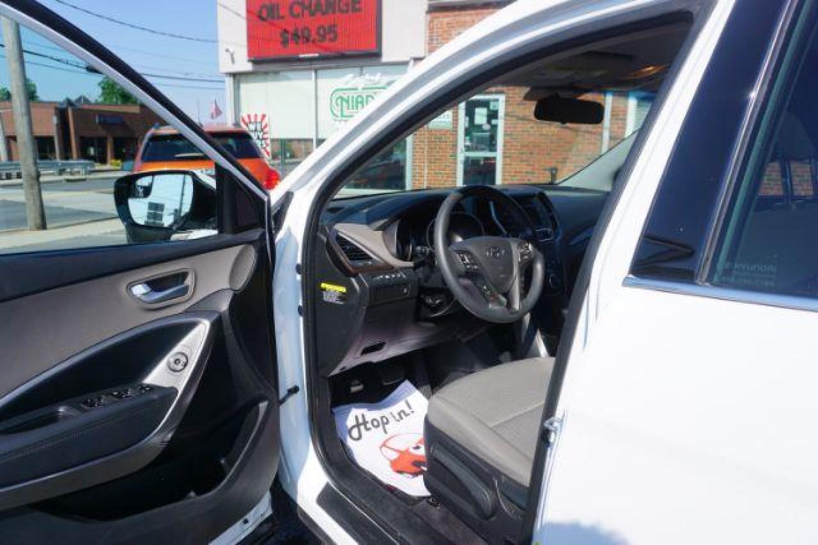 2018 Pearl White /Beige, cloth Hyundai Santa Fe Sport 2.4 AWD (5NMZTDLB1JH) with an 2.4L L4 DOHC 16V engine, 6-Speed Automatic transmission, located at 312 Centre Ave, Schuylkill Haven, PA, 17972, (570) 593-5278, 40.638130, -76.177383 - Brand New factory engine - Photo#14