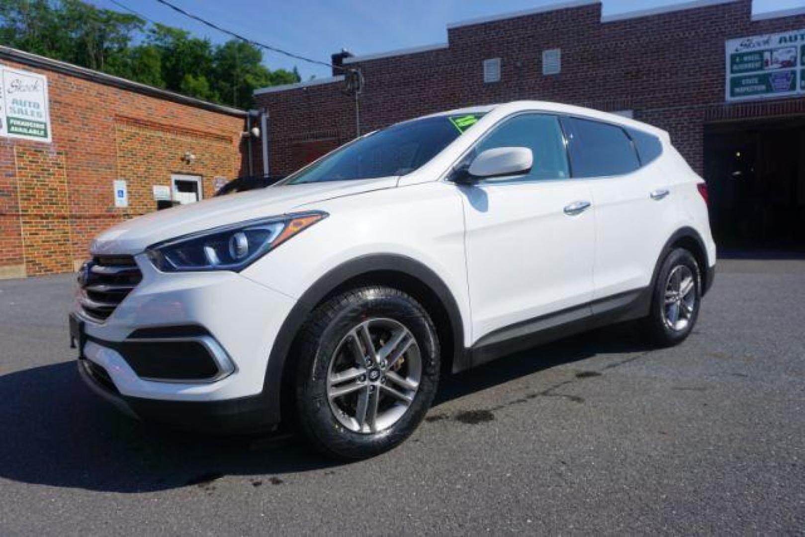 2018 Pearl White /Beige, cloth Hyundai Santa Fe Sport 2.4 AWD (5NMZTDLB1JH) with an 2.4L L4 DOHC 16V engine, 6-Speed Automatic transmission, located at 312 Centre Ave, Schuylkill Haven, PA, 17972, (570) 593-5278, 40.638130, -76.177383 - Brand New factory engine - Photo#3