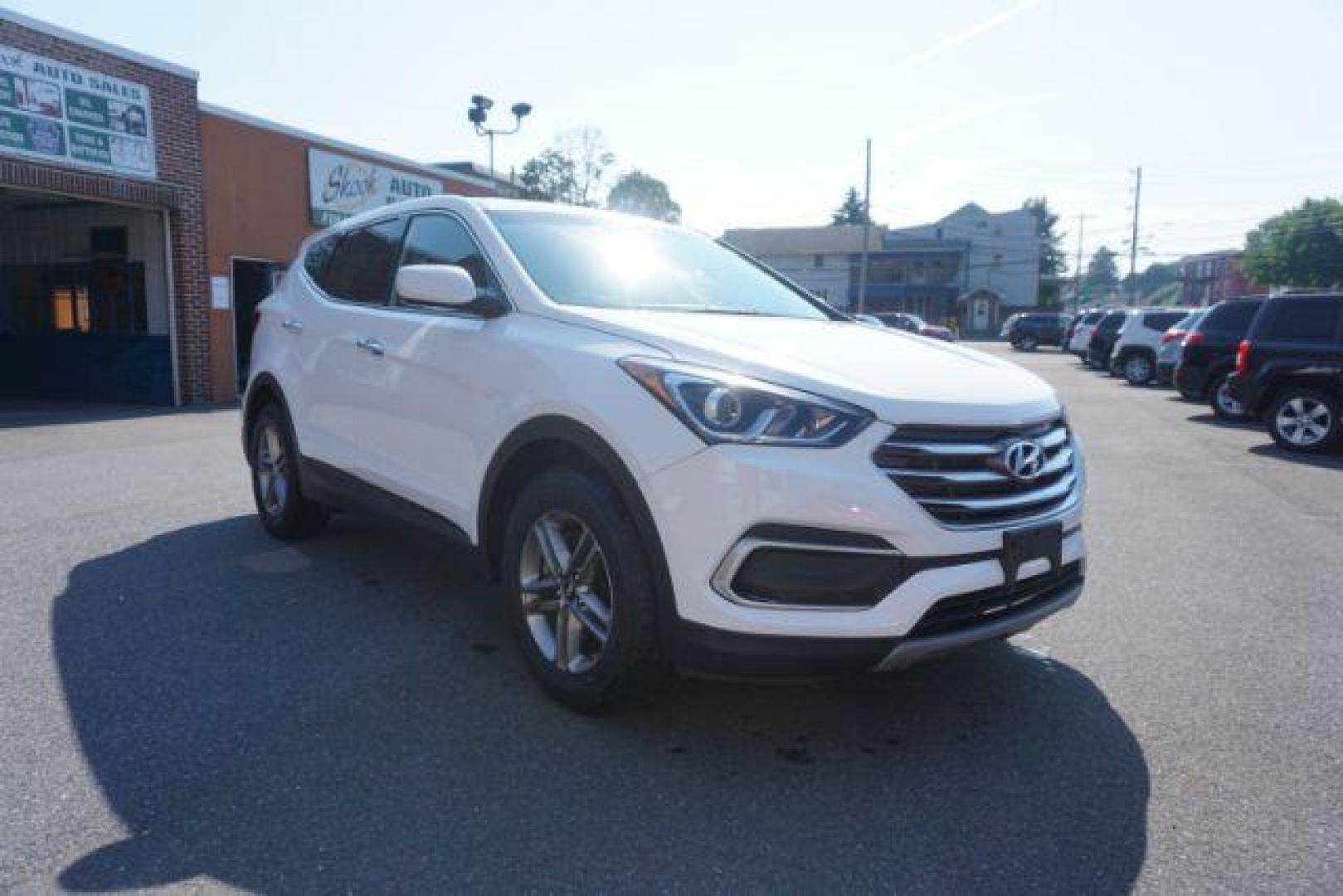 2018 Pearl White /Beige, cloth Hyundai Santa Fe Sport 2.4 AWD (5NMZTDLB1JH) with an 2.4L L4 DOHC 16V engine, 6-Speed Automatic transmission, located at 312 Centre Ave, Schuylkill Haven, PA, 17972, (570) 593-5278, 40.638130, -76.177383 - Brand New factory engine - Photo#5