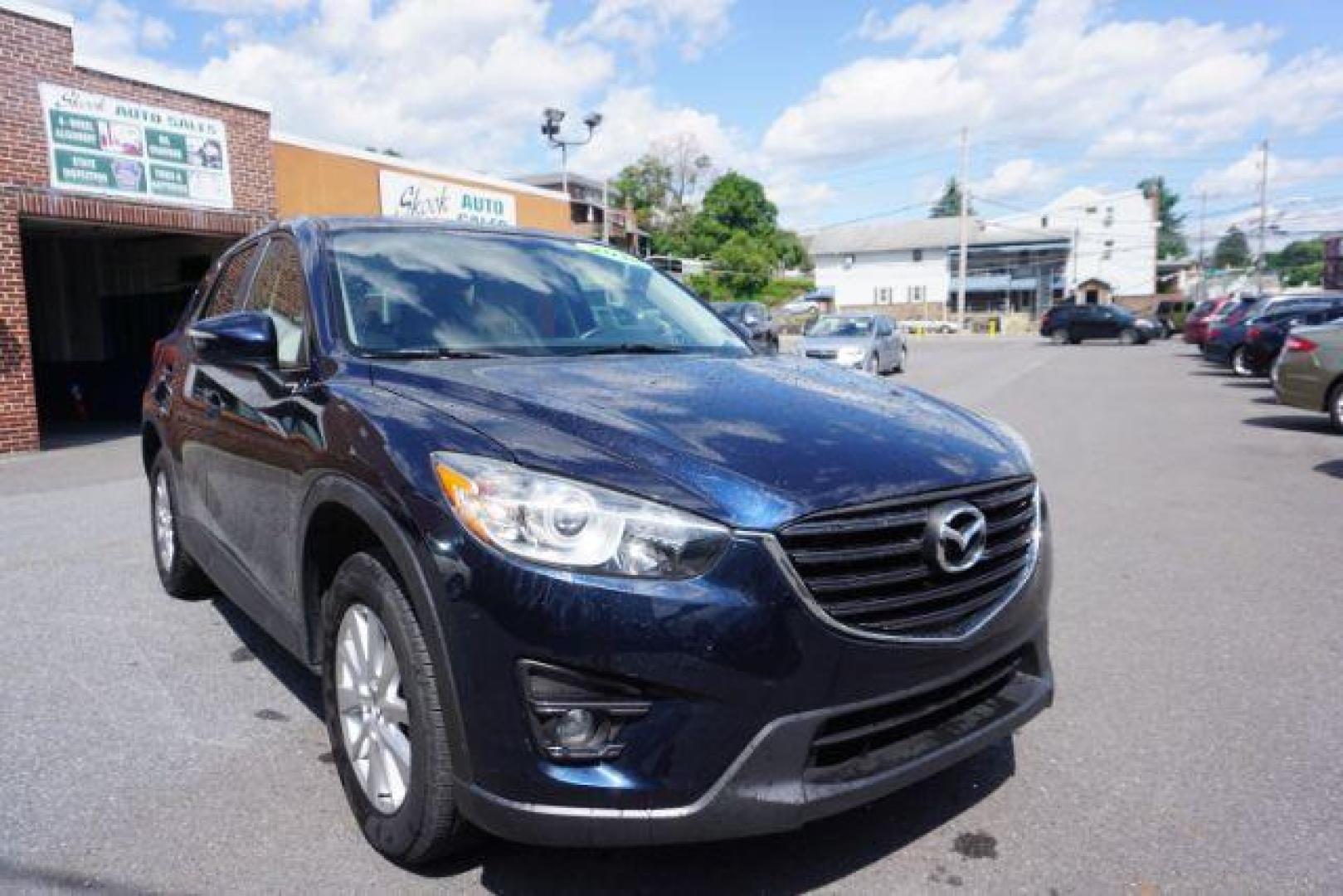 2016 Blue /sand Mazda CX-5 Touring AWD (JM3KE4CY8G0) with an 2.5L L4 DOHC 16V engine, 6-Speed Automatic transmission, located at 312 Centre Ave, Schuylkill Haven, PA, 17972, (570) 593-5278, 40.638130, -76.177383 - rear parking sensors - Photo#12