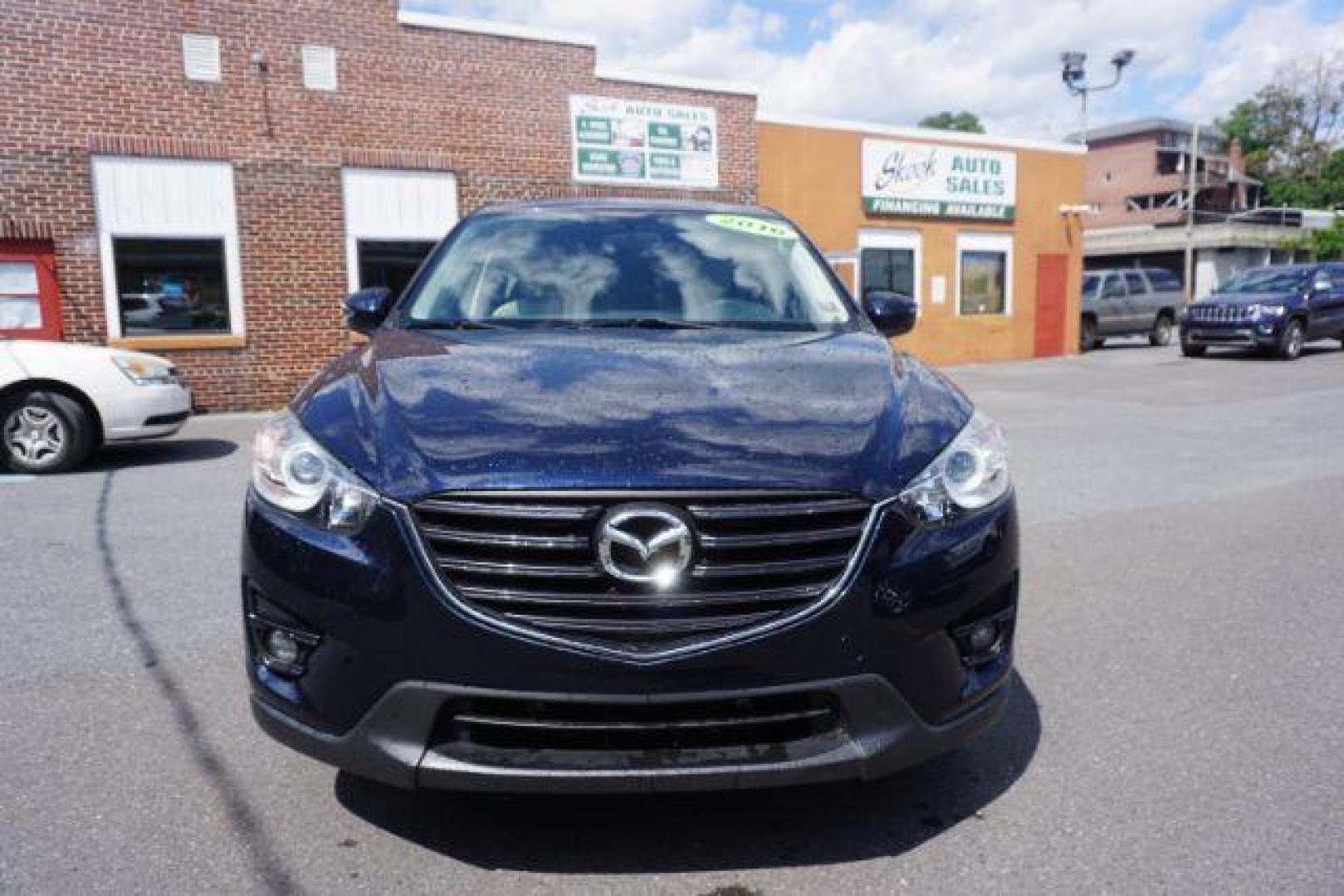 2016 Blue /sand Mazda CX-5 Touring AWD (JM3KE4CY8G0) with an 2.5L L4 DOHC 16V engine, 6-Speed Automatic transmission, located at 312 Centre Ave, Schuylkill Haven, PA, 17972, (570) 593-5278, 40.638130, -76.177383 - rear parking sensors - Photo#13