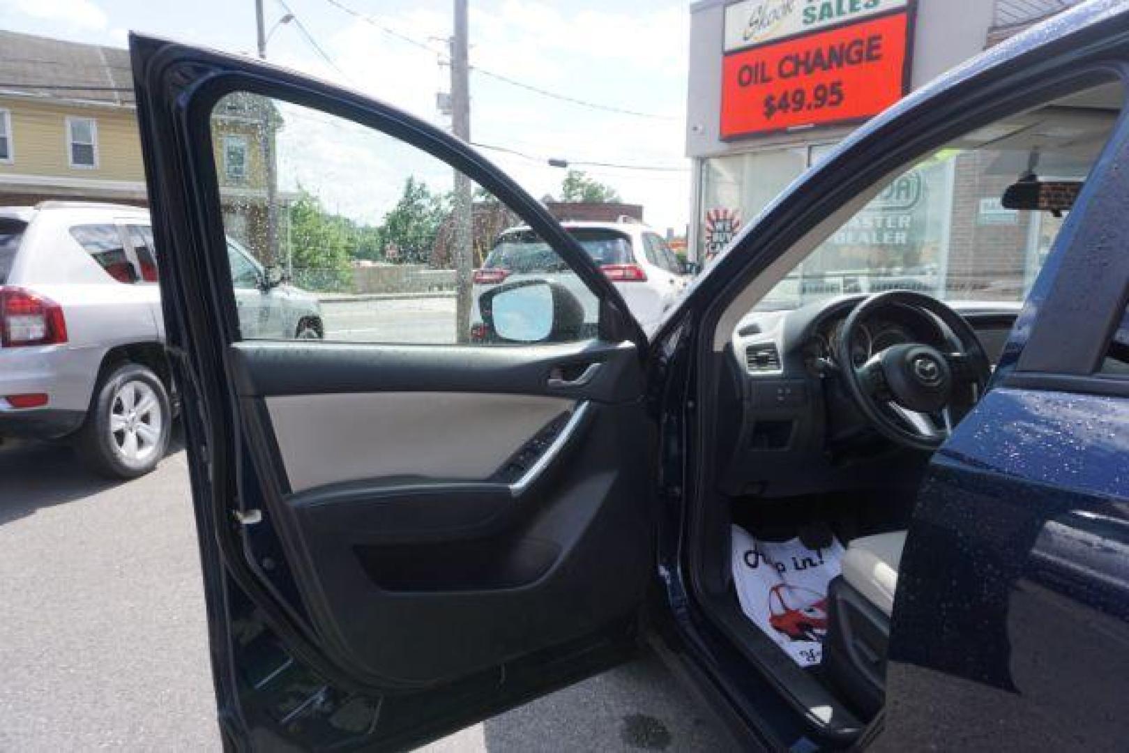 2016 Blue /sand Mazda CX-5 Touring AWD (JM3KE4CY8G0) with an 2.5L L4 DOHC 16V engine, 6-Speed Automatic transmission, located at 312 Centre Ave, Schuylkill Haven, PA, 17972, (570) 593-5278, 40.638130, -76.177383 - rear parking sensors - Photo#15