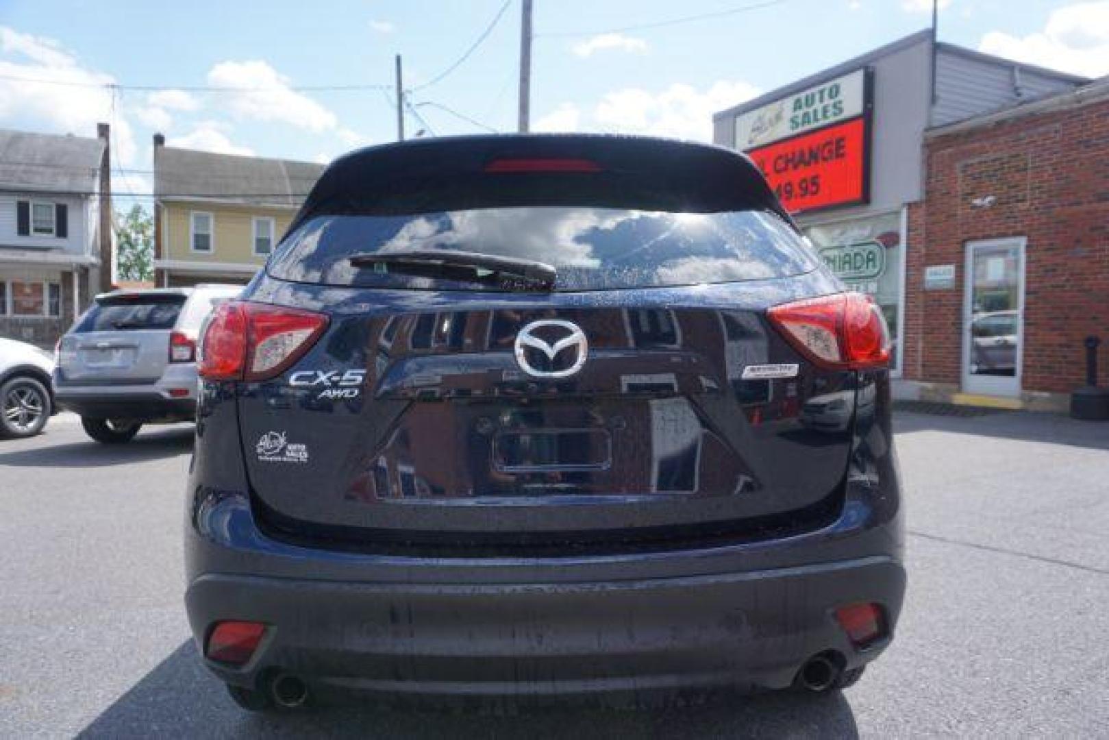 2016 Blue /sand Mazda CX-5 Touring AWD (JM3KE4CY8G0) with an 2.5L L4 DOHC 16V engine, 6-Speed Automatic transmission, located at 312 Centre Ave, Schuylkill Haven, PA, 17972, (570) 593-5278, 40.638130, -76.177383 - rear parking sensors - Photo#6