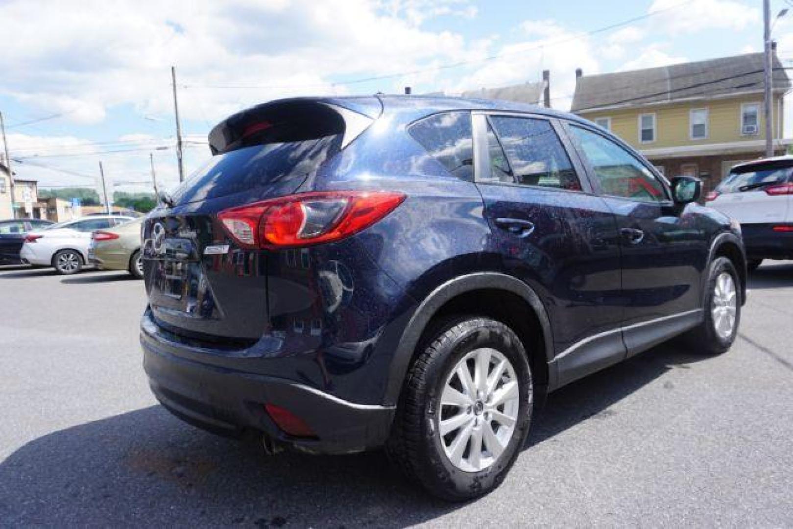 2016 Blue /sand Mazda CX-5 Touring AWD (JM3KE4CY8G0) with an 2.5L L4 DOHC 16V engine, 6-Speed Automatic transmission, located at 312 Centre Ave, Schuylkill Haven, PA, 17972, (570) 593-5278, 40.638130, -76.177383 - rear parking sensors - Photo#7