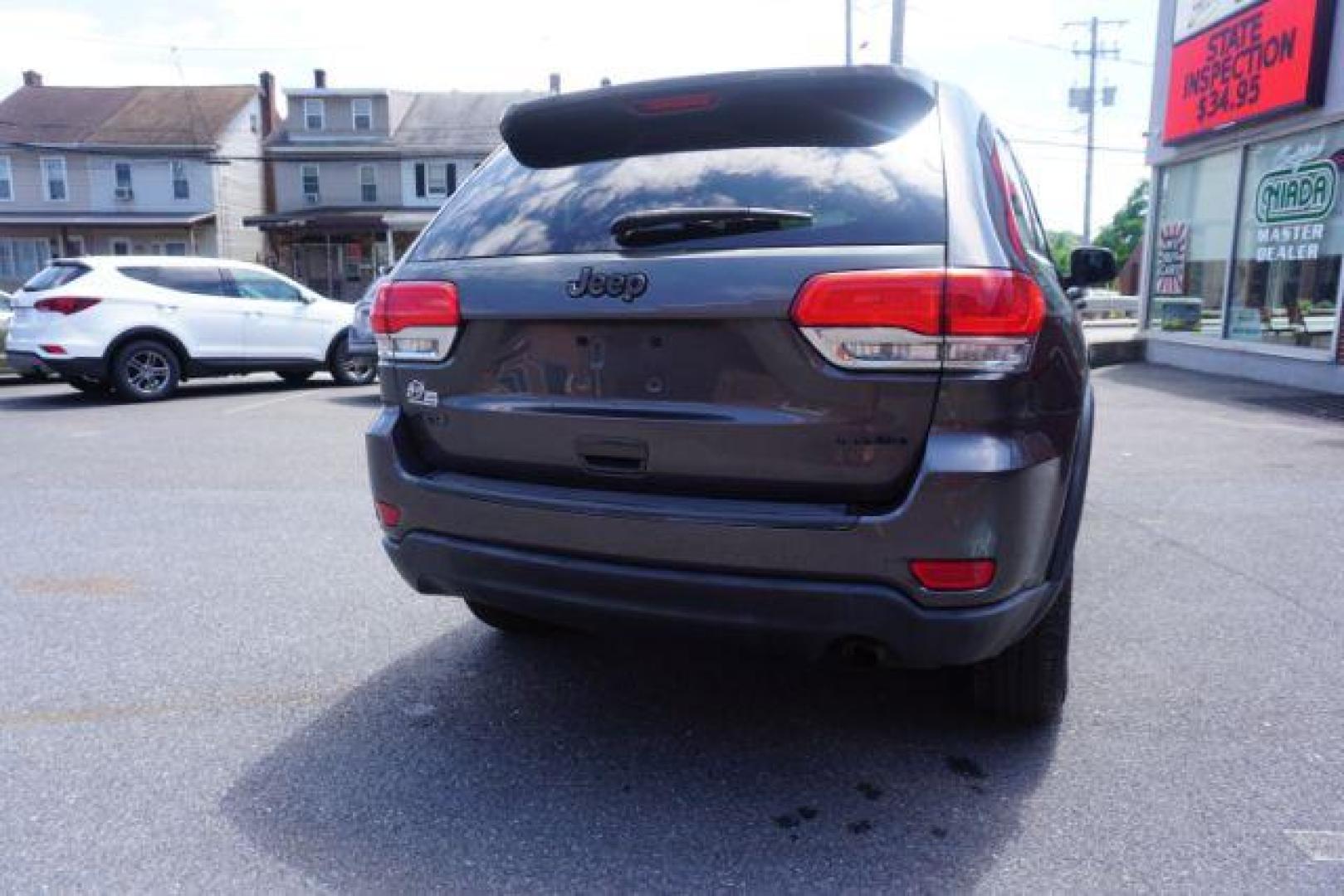 2015 Granite Crystal Met CC /Black Jeep Grand Cherokee Laredo 4WD (1C4RJFAG4FC) with an 3.6L V6 DOHC 24V engine, 8-Speed Automatic transmission, located at 312 Centre Ave, Schuylkill Haven, PA, 17972, (570) 593-5278, 40.638130, -76.177383 - heated front seats, universal garage door opener - Photo#13