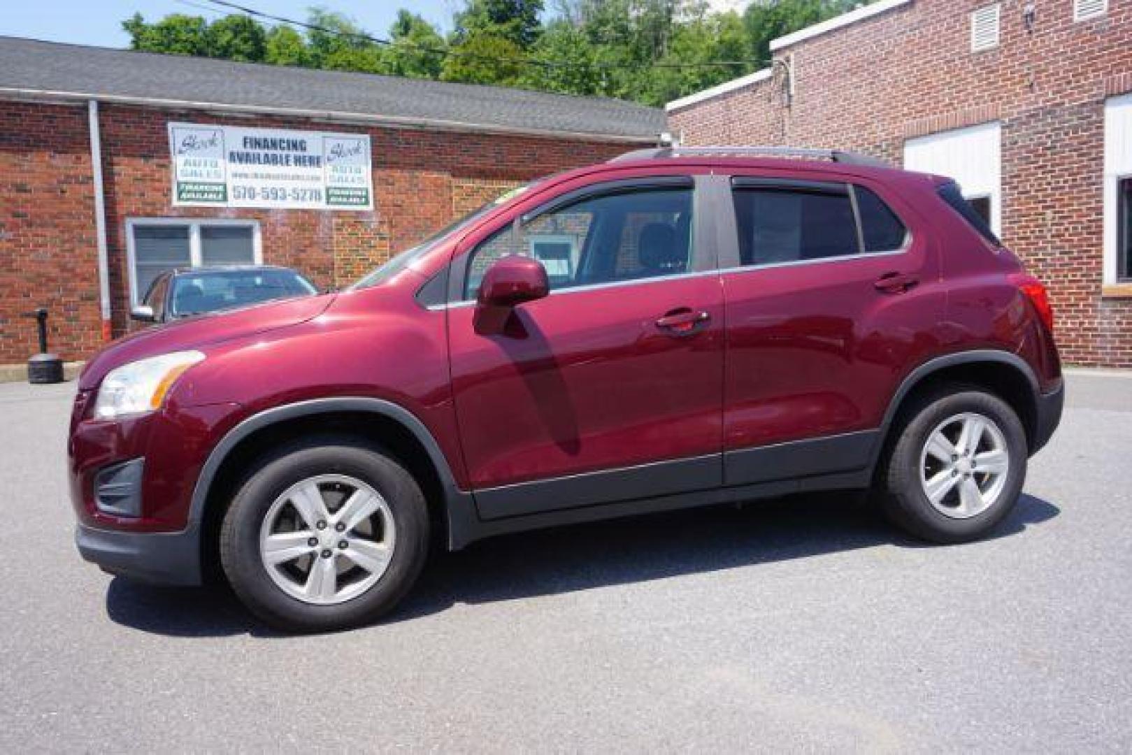 2016 Blaze Red Chevrolet Trax LT AWD (3GNCJPSB6GL) with an 1.4L L4 DOHC 16V engine, 6-Speed Automatic transmission, located at 312 Centre Ave, Schuylkill Haven, PA, 17972, (570) 593-5278, 40.638130, -76.177383 - power driver's seat, rear parking sensor, synthetic leather seats - Photo#0