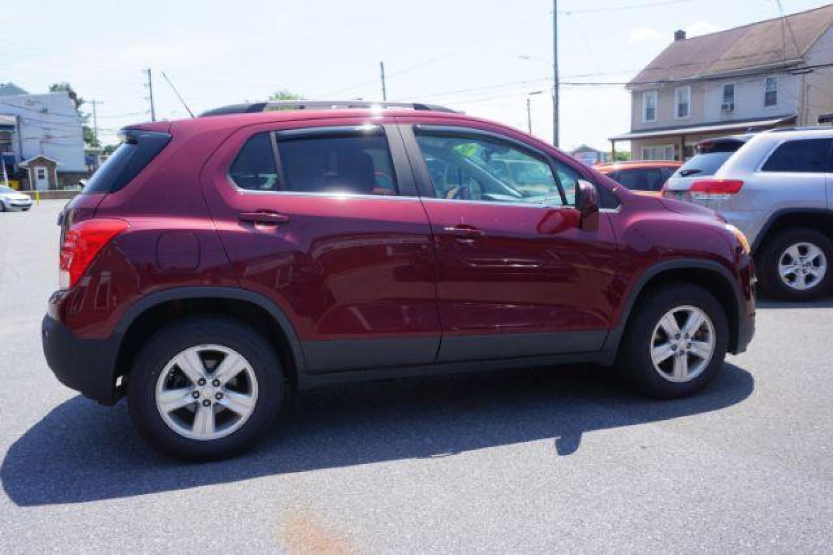 2016 Blaze Red Chevrolet Trax LT AWD (3GNCJPSB6GL) with an 1.4L L4 DOHC 16V engine, 6-Speed Automatic transmission, located at 312 Centre Ave, Schuylkill Haven, PA, 17972, (570) 593-5278, 40.638130, -76.177383 - power driver's seat, rear parking sensor, synthetic leather seats - Photo#9