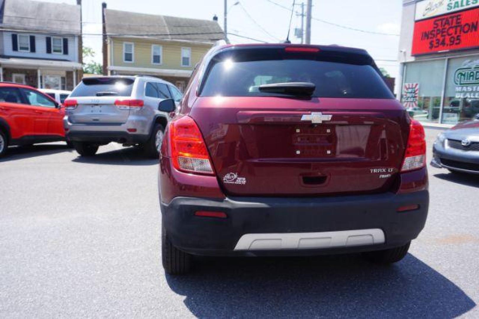 2016 Blaze Red Chevrolet Trax LT AWD (3GNCJPSB6GL) with an 1.4L L4 DOHC 16V engine, 6-Speed Automatic transmission, located at 312 Centre Ave, Schuylkill Haven, PA, 17972, (570) 593-5278, 40.638130, -76.177383 - power driver's seat, rear parking sensor, synthetic leather seats - Photo#13