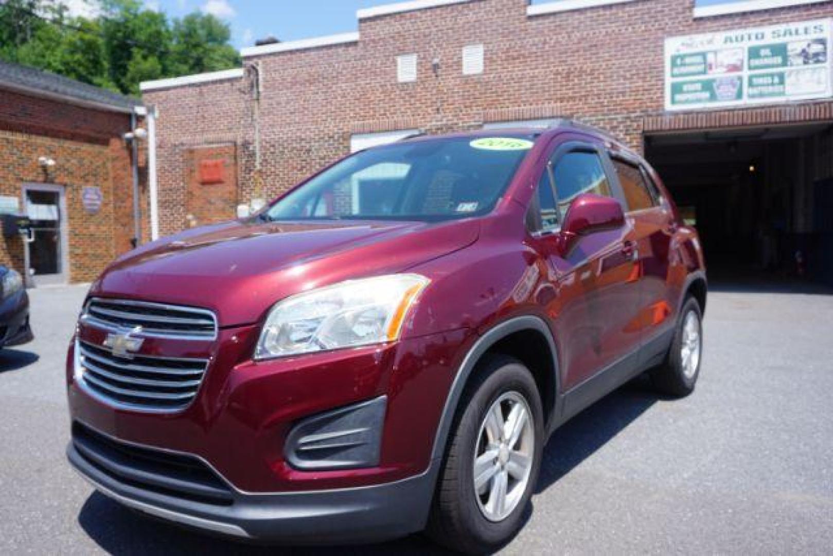 2016 Blaze Red Chevrolet Trax LT AWD (3GNCJPSB6GL) with an 1.4L L4 DOHC 16V engine, 6-Speed Automatic transmission, located at 312 Centre Ave, Schuylkill Haven, PA, 17972, (570) 593-5278, 40.638130, -76.177383 - power driver's seat, rear parking sensor, synthetic leather seats - Photo#3