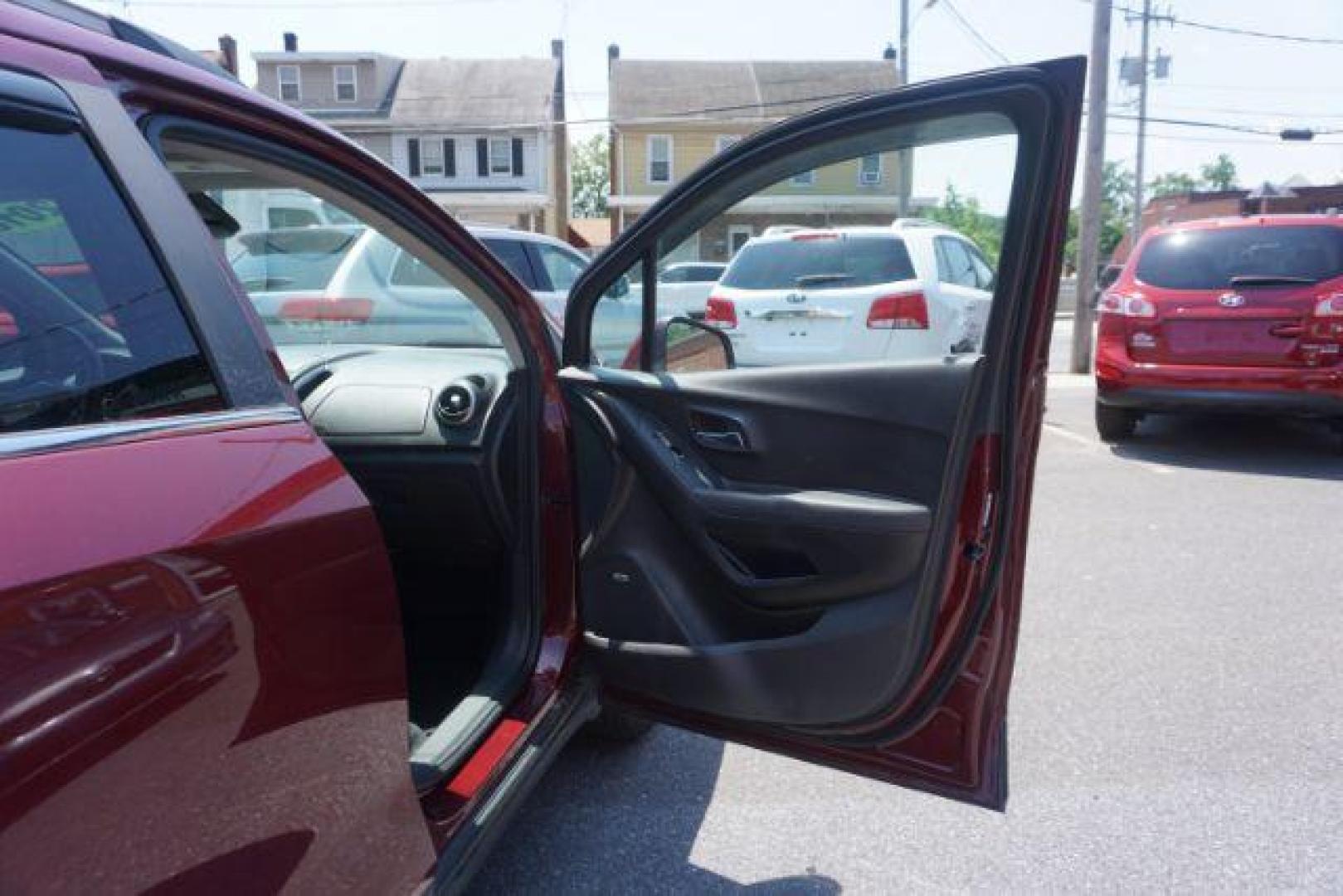 2016 Blaze Red Chevrolet Trax LT AWD (3GNCJPSB6GL) with an 1.4L L4 DOHC 16V engine, 6-Speed Automatic transmission, located at 312 Centre Ave, Schuylkill Haven, PA, 17972, (570) 593-5278, 40.638130, -76.177383 - power driver's seat, rear parking sensor, synthetic leather seats - Photo#44