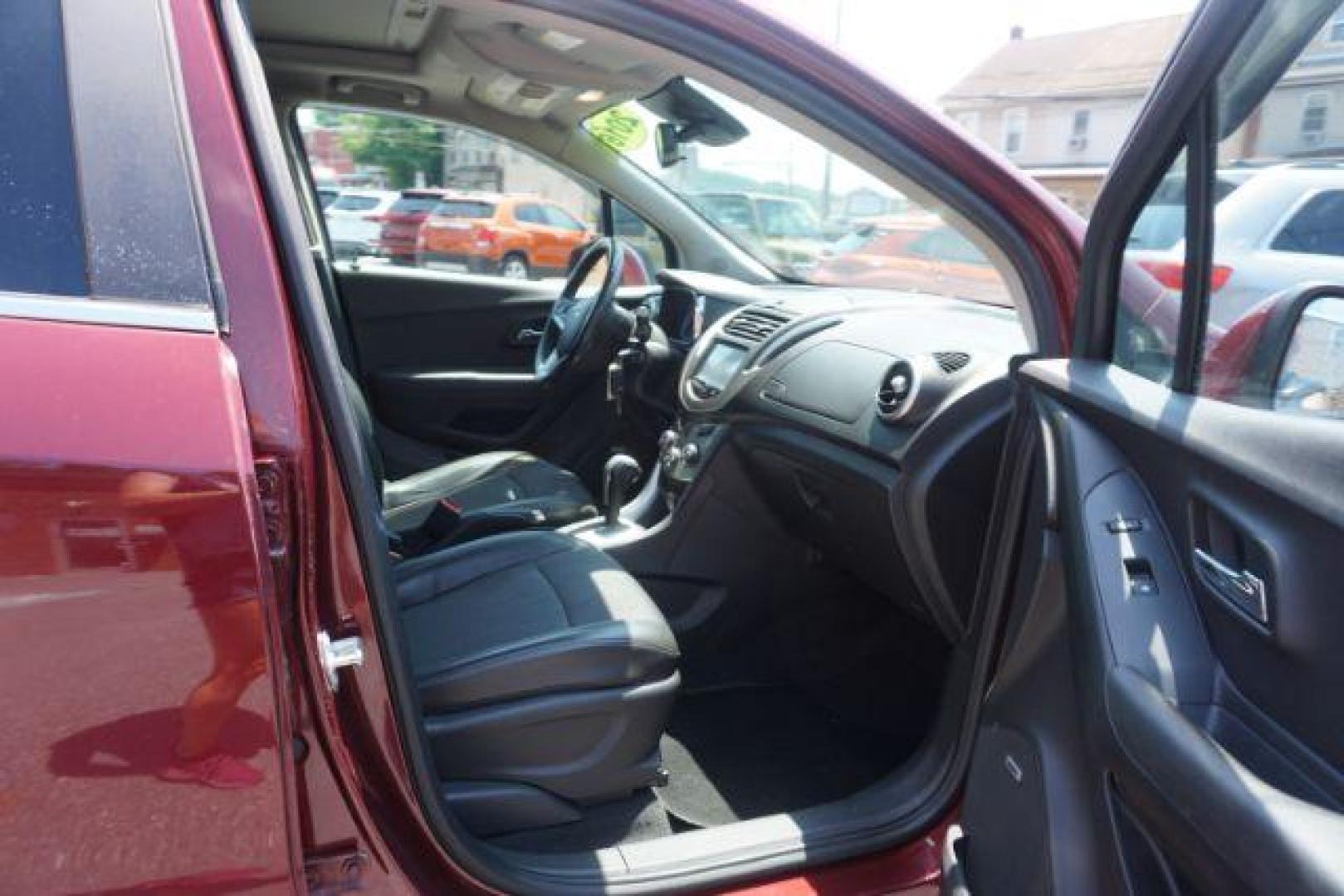 2016 Blaze Red Chevrolet Trax LT AWD (3GNCJPSB6GL) with an 1.4L L4 DOHC 16V engine, 6-Speed Automatic transmission, located at 312 Centre Ave, Schuylkill Haven, PA, 17972, (570) 593-5278, 40.638130, -76.177383 - power driver's seat, rear parking sensor, synthetic leather seats - Photo#46