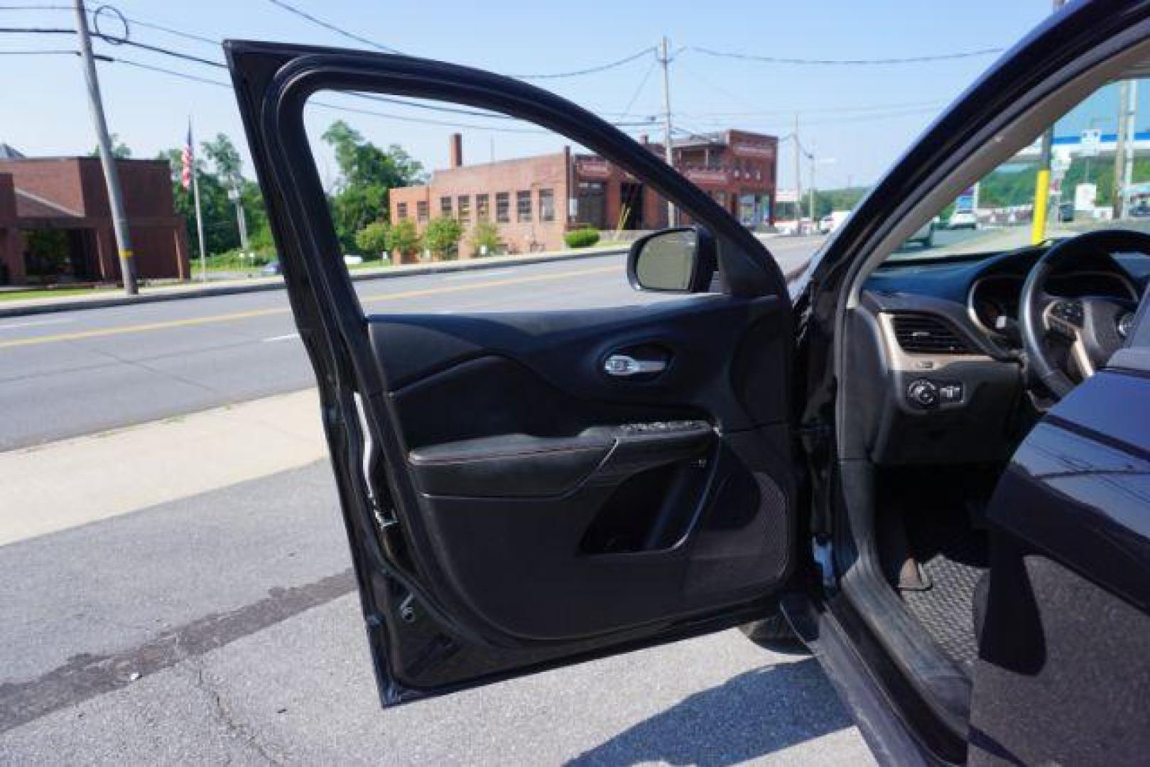 2016 Brilliant Black Crystal Pearl Coat /Black/Light Frost Beige, premium cloth Jeep Cherokee Latitude 4WD (1C4PJMCB2GW) with an 2.4L L4 DOHC 16V engine, 9-Speed Automatic transmission, located at 312 Centre Ave, Schuylkill Haven, PA, 17972, (570) 593-5278, 40.638130, -76.177383 - blind spot monitor, heated front seats, heated exterior mirrors, power drivers seat, power liftgate, power sunroof, rear parking sensors, universal garage door opener - Photo#16