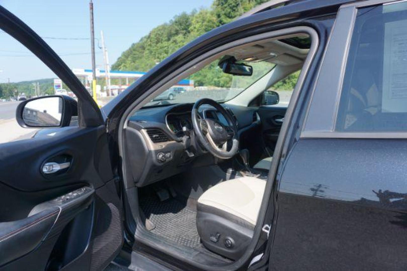 2016 Brilliant Black Crystal Pearl Coat /Black/Light Frost Beige, premium cloth Jeep Cherokee Latitude 4WD (1C4PJMCB2GW) with an 2.4L L4 DOHC 16V engine, 9-Speed Automatic transmission, located at 312 Centre Ave, Schuylkill Haven, PA, 17972, (570) 593-5278, 40.638130, -76.177383 - blind spot monitor, heated front seats, heated exterior mirrors, power drivers seat, power liftgate, power sunroof, rear parking sensors, universal garage door opener - Photo#17