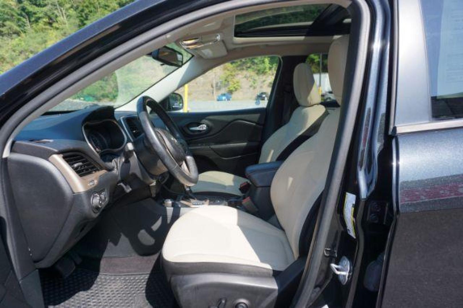 2016 Brilliant Black Crystal Pearl Coat /Black/Light Frost Beige, premium cloth Jeep Cherokee Latitude 4WD (1C4PJMCB2GW) with an 2.4L L4 DOHC 16V engine, 9-Speed Automatic transmission, located at 312 Centre Ave, Schuylkill Haven, PA, 17972, (570) 593-5278, 40.638130, -76.177383 - blind spot monitor, heated front seats, heated exterior mirrors, power drivers seat, power liftgate, power sunroof, rear parking sensors, universal garage door opener - Photo#19