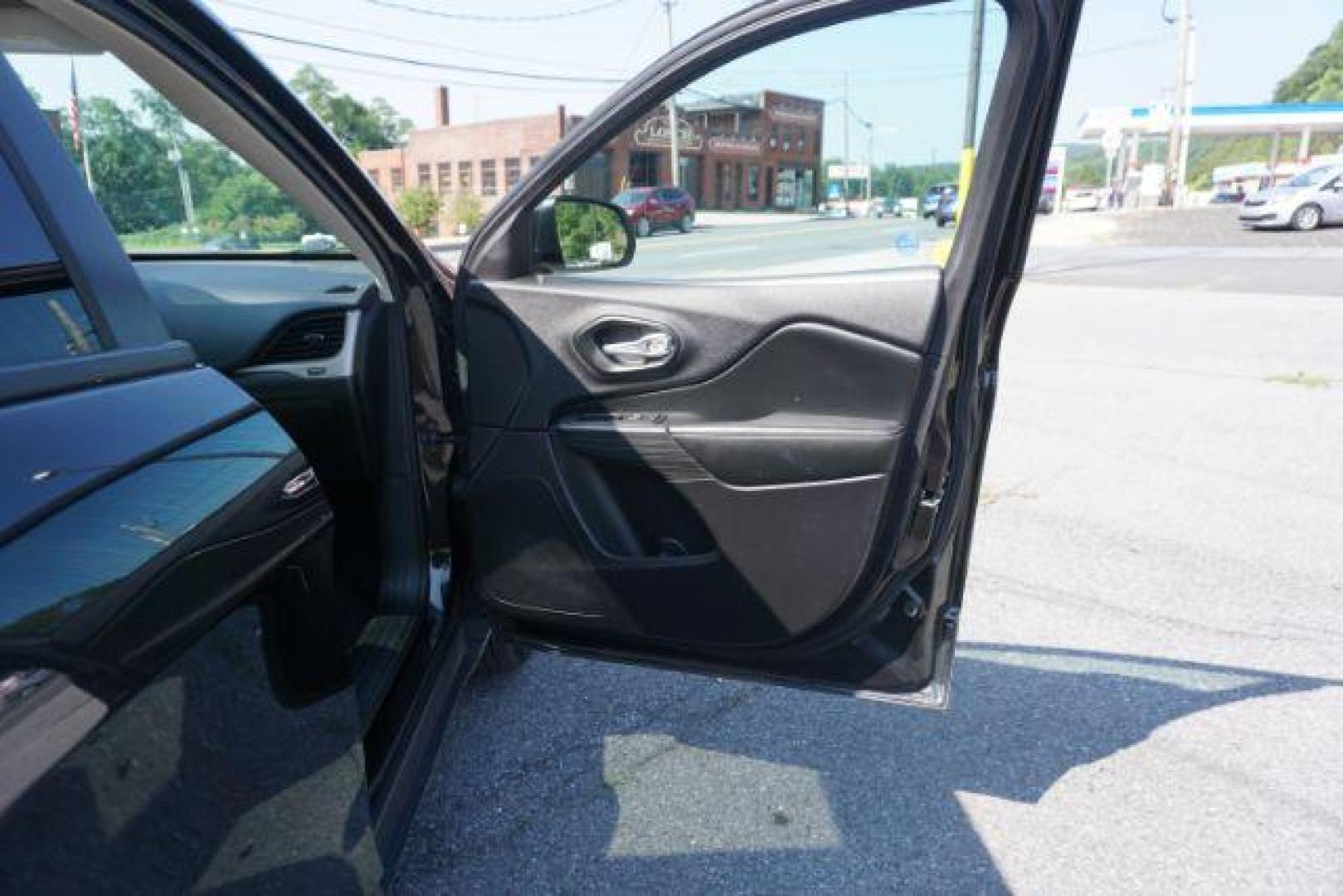 2016 Brilliant Black Crystal Pearl Coat /Black/Light Frost Beige, premium cloth Jeep Cherokee Latitude 4WD (1C4PJMCB2GW) with an 2.4L L4 DOHC 16V engine, 9-Speed Automatic transmission, located at 312 Centre Ave, Schuylkill Haven, PA, 17972, (570) 593-5278, 40.638130, -76.177383 - blind spot monitor, heated front seats, heated exterior mirrors, power drivers seat, power liftgate, power sunroof, rear parking sensors, universal garage door opener - Photo#46