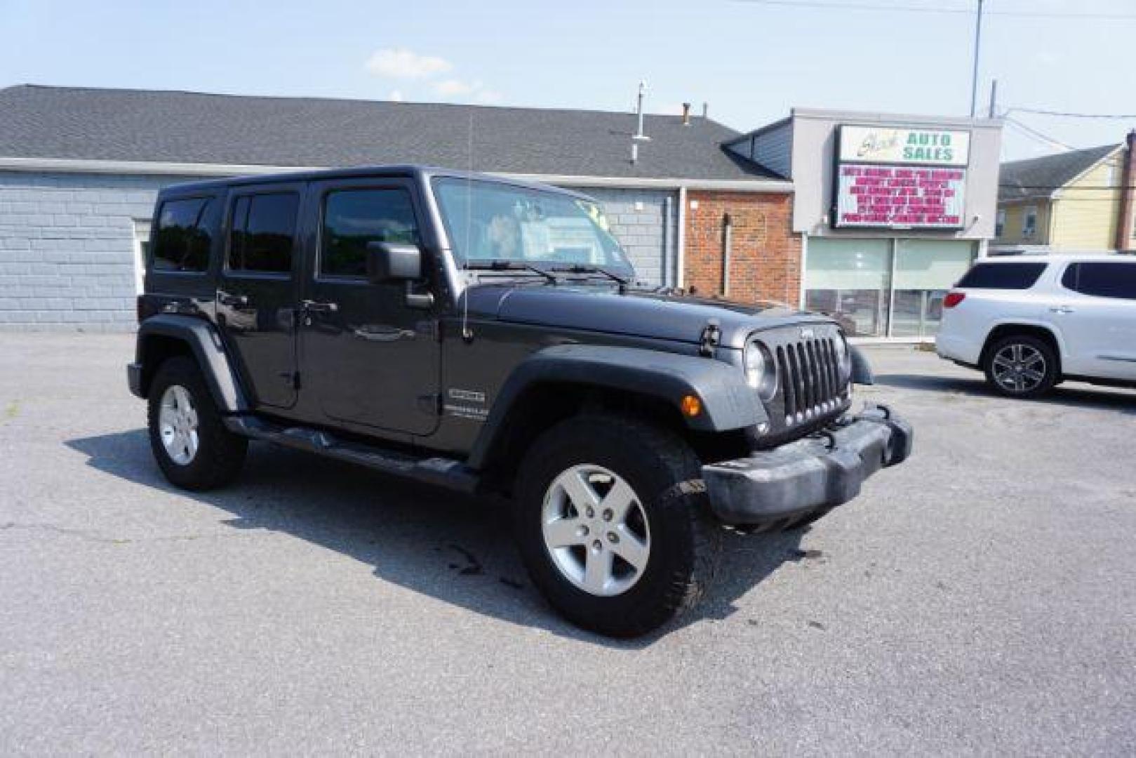 2016 Granite Crystal Metallic Clear Coat /Black, cloth Jeep Wrangler Unlimited Sport 4WD (1C4BJWDG5GL) with an 3.6L V6 DOHC 24V FFV engine, located at 312 Centre Ave, Schuylkill Haven, PA, 17972, (570) 593-5278, 40.638130, -76.177383 - Hard Top, Locking limited slip differential, Bluetooth connection - Photo#0