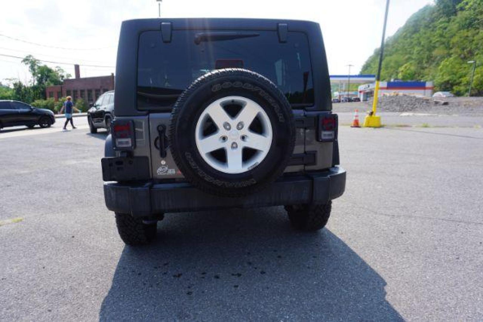 2016 Granite Crystal Metallic Clear Coat /Black, cloth Jeep Wrangler Unlimited Sport 4WD (1C4BJWDG5GL) with an 3.6L V6 DOHC 24V FFV engine, located at 312 Centre Ave, Schuylkill Haven, PA, 17972, (570) 593-5278, 40.638130, -76.177383 - Hard Top, Locking limited slip differential, Bluetooth connection - Photo#9