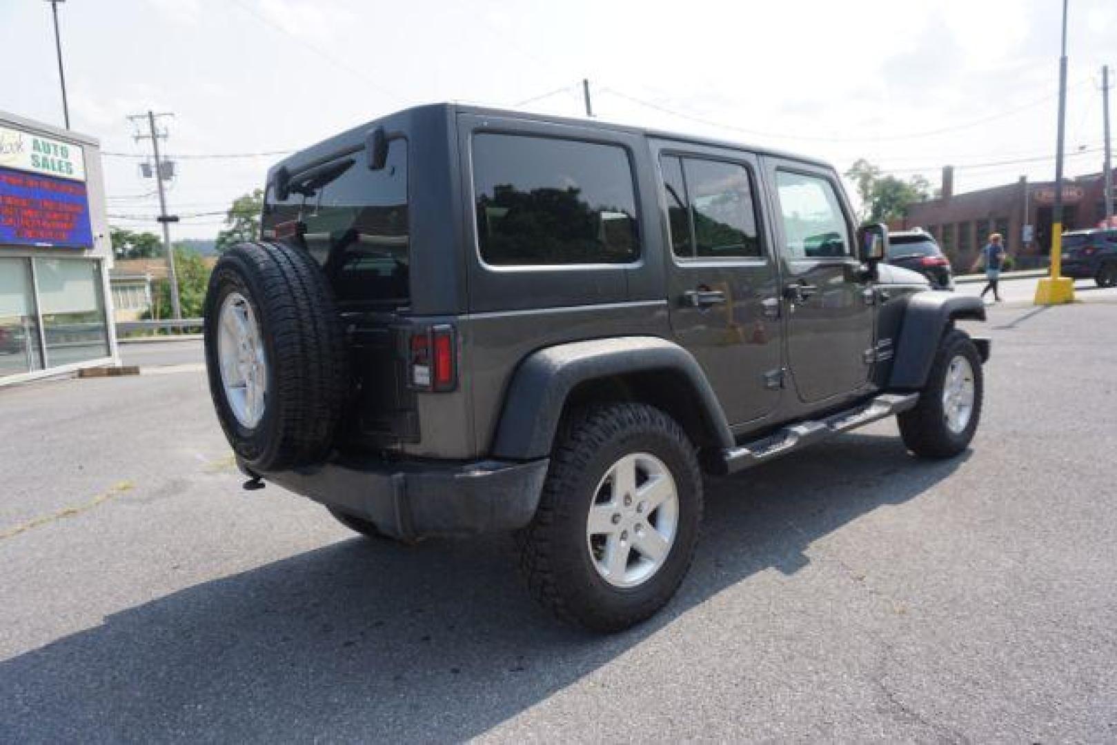 2016 Granite Crystal Metallic Clear Coat /Black, cloth Jeep Wrangler Unlimited Sport 4WD (1C4BJWDG5GL) with an 3.6L V6 DOHC 24V FFV engine, located at 312 Centre Ave, Schuylkill Haven, PA, 17972, (570) 593-5278, 40.638130, -76.177383 - Hard Top, Locking limited slip differential, Bluetooth connection - Photo#10