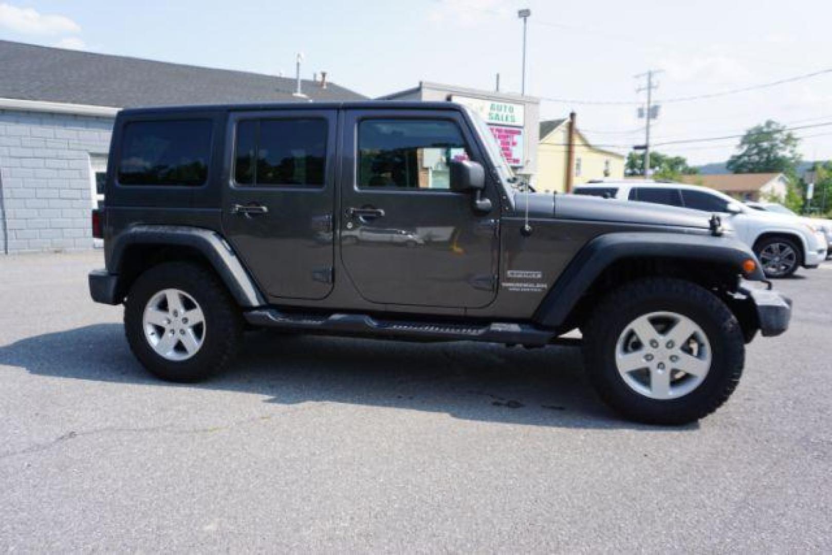 2016 Granite Crystal Metallic Clear Coat /Black, cloth Jeep Wrangler Unlimited Sport 4WD (1C4BJWDG5GL) with an 3.6L V6 DOHC 24V FFV engine, located at 312 Centre Ave, Schuylkill Haven, PA, 17972, (570) 593-5278, 40.638130, -76.177383 - Hard Top, Locking limited slip differential, Bluetooth connection - Photo#13