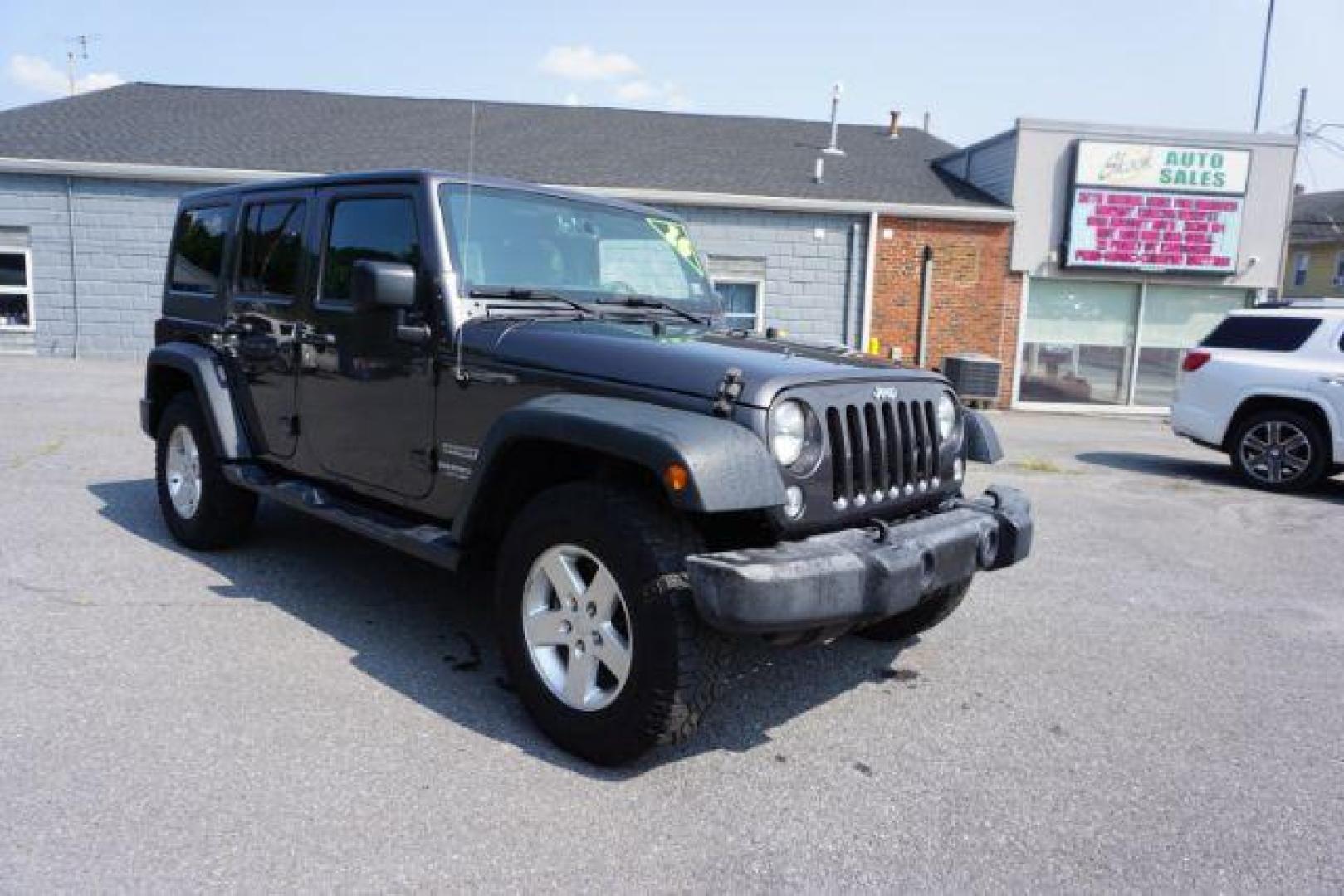 2016 Granite Crystal Metallic Clear Coat /Black, cloth Jeep Wrangler Unlimited Sport 4WD (1C4BJWDG5GL) with an 3.6L V6 DOHC 24V FFV engine, located at 312 Centre Ave, Schuylkill Haven, PA, 17972, (570) 593-5278, 40.638130, -76.177383 - Hard Top, Locking limited slip differential, Bluetooth connection - Photo#1