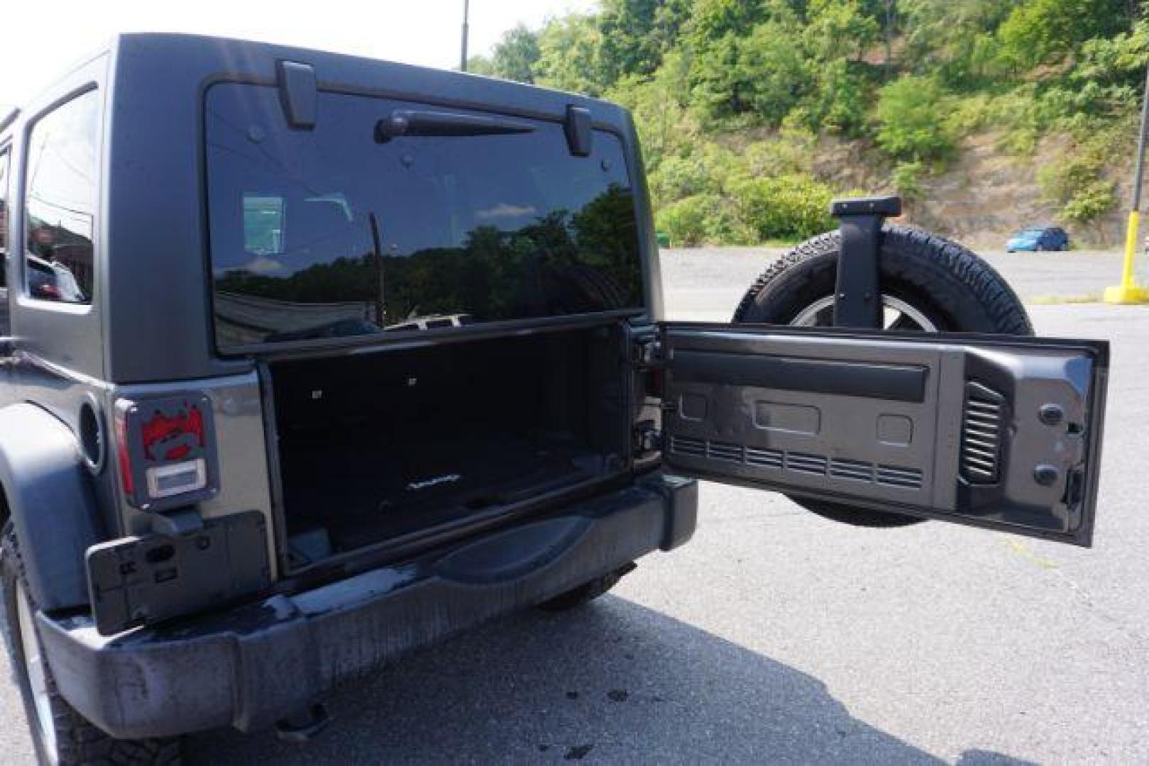 2016 Granite Crystal Metallic Clear Coat /Black, cloth Jeep Wrangler Unlimited Sport 4WD (1C4BJWDG5GL) with an 3.6L V6 DOHC 24V FFV engine, located at 312 Centre Ave, Schuylkill Haven, PA, 17972, (570) 593-5278, 40.638130, -76.177383 - Hard Top, Locking limited slip differential, Bluetooth connection - Photo#36