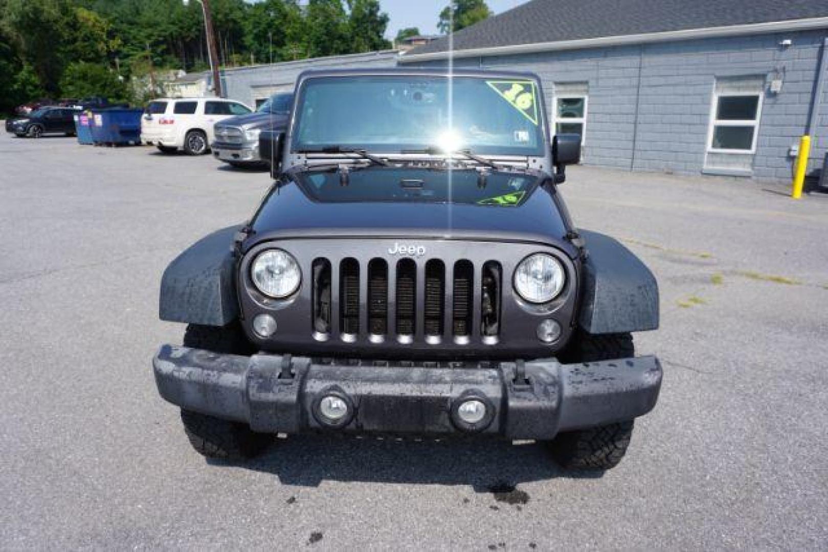 2016 Granite Crystal Metallic Clear Coat /Black, cloth Jeep Wrangler Unlimited Sport 4WD (1C4BJWDG5GL) with an 3.6L V6 DOHC 24V FFV engine, located at 312 Centre Ave, Schuylkill Haven, PA, 17972, (570) 593-5278, 40.638130, -76.177383 - Hard Top, Locking limited slip differential, Bluetooth connection - Photo#3