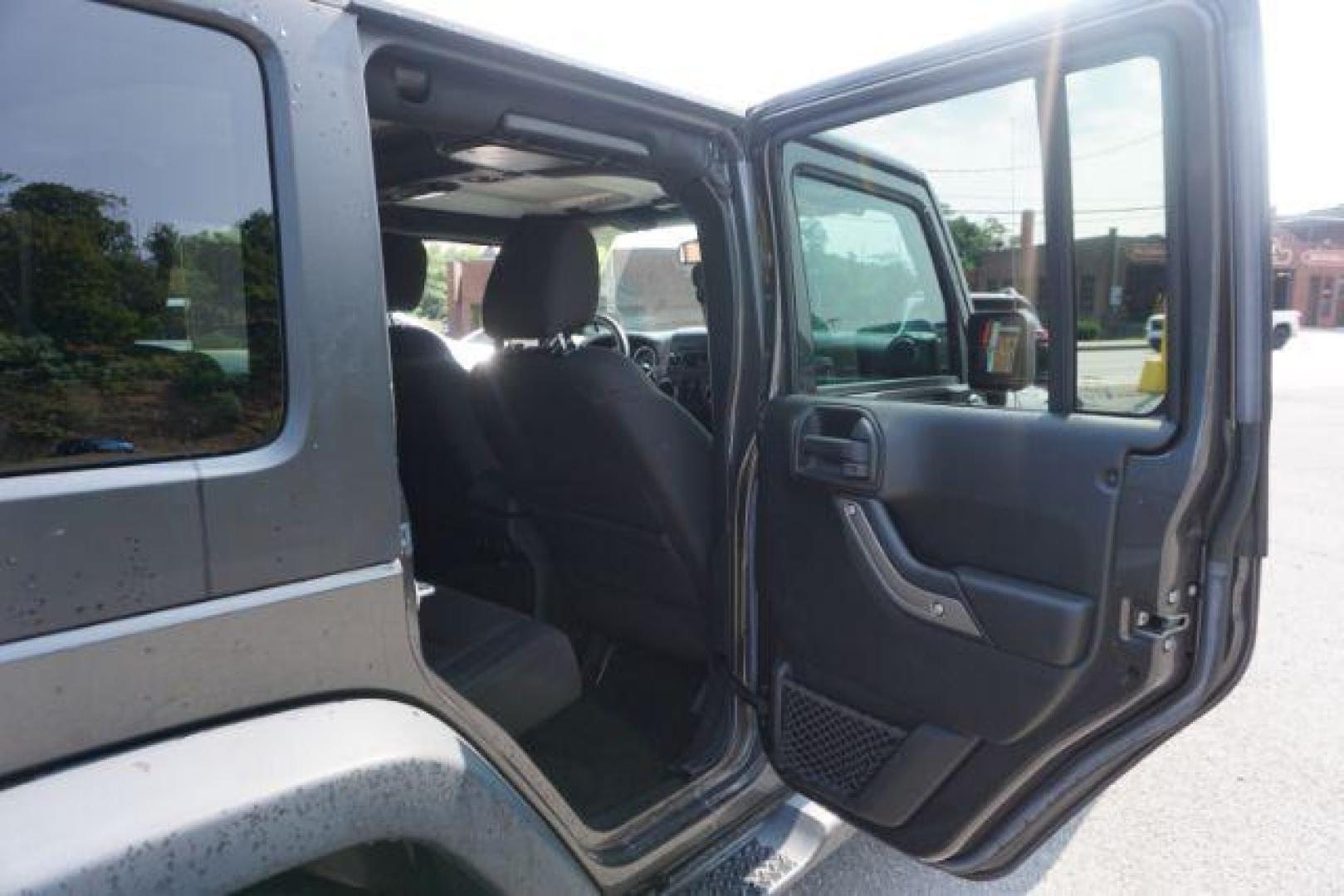 2016 Granite Crystal Metallic Clear Coat /Black, cloth Jeep Wrangler Unlimited Sport 4WD (1C4BJWDG5GL) with an 3.6L V6 DOHC 24V FFV engine, located at 312 Centre Ave, Schuylkill Haven, PA, 17972, (570) 593-5278, 40.638130, -76.177383 - Hard Top, Locking limited slip differential, Bluetooth connection - Photo#39