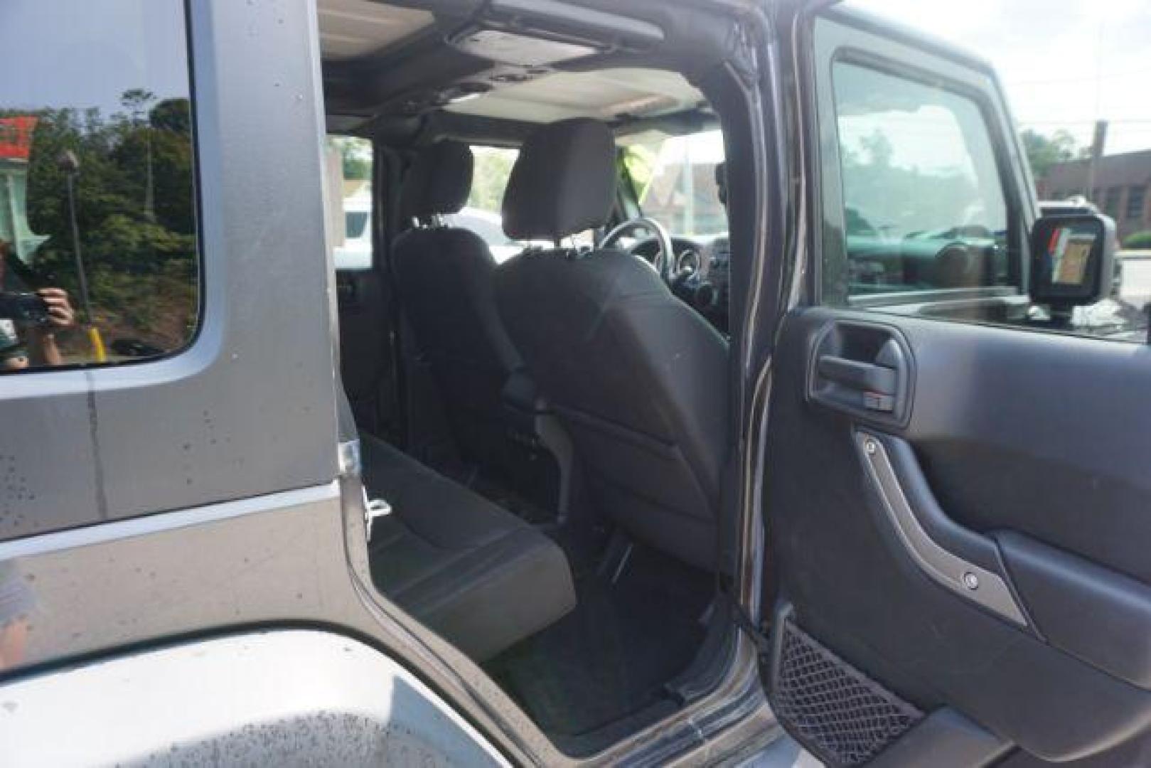 2016 Granite Crystal Metallic Clear Coat /Black, cloth Jeep Wrangler Unlimited Sport 4WD (1C4BJWDG5GL) with an 3.6L V6 DOHC 24V FFV engine, located at 312 Centre Ave, Schuylkill Haven, PA, 17972, (570) 593-5278, 40.638130, -76.177383 - Hard Top, Locking limited slip differential, Bluetooth connection - Photo#41