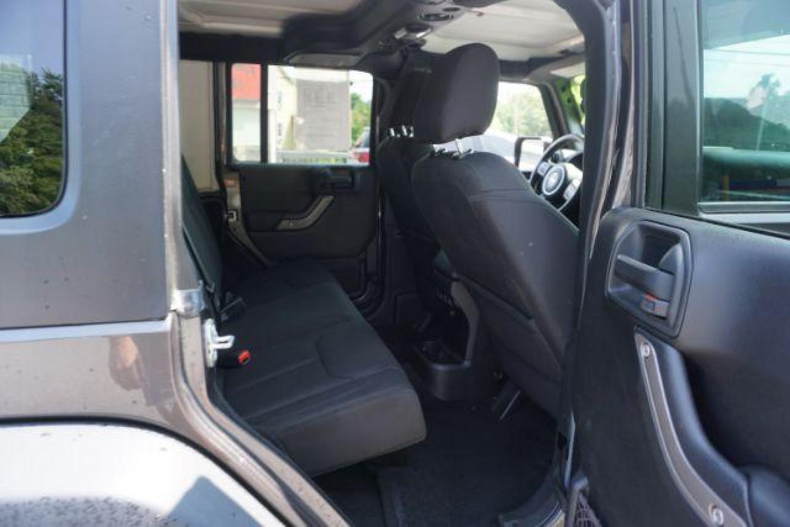 2016 Granite Crystal Metallic Clear Coat /Black, cloth Jeep Wrangler Unlimited Sport 4WD (1C4BJWDG5GL) with an 3.6L V6 DOHC 24V FFV engine, located at 312 Centre Ave, Schuylkill Haven, PA, 17972, (570) 593-5278, 40.638130, -76.177383 - Hard Top, Locking limited slip differential, Bluetooth connection - Photo#42