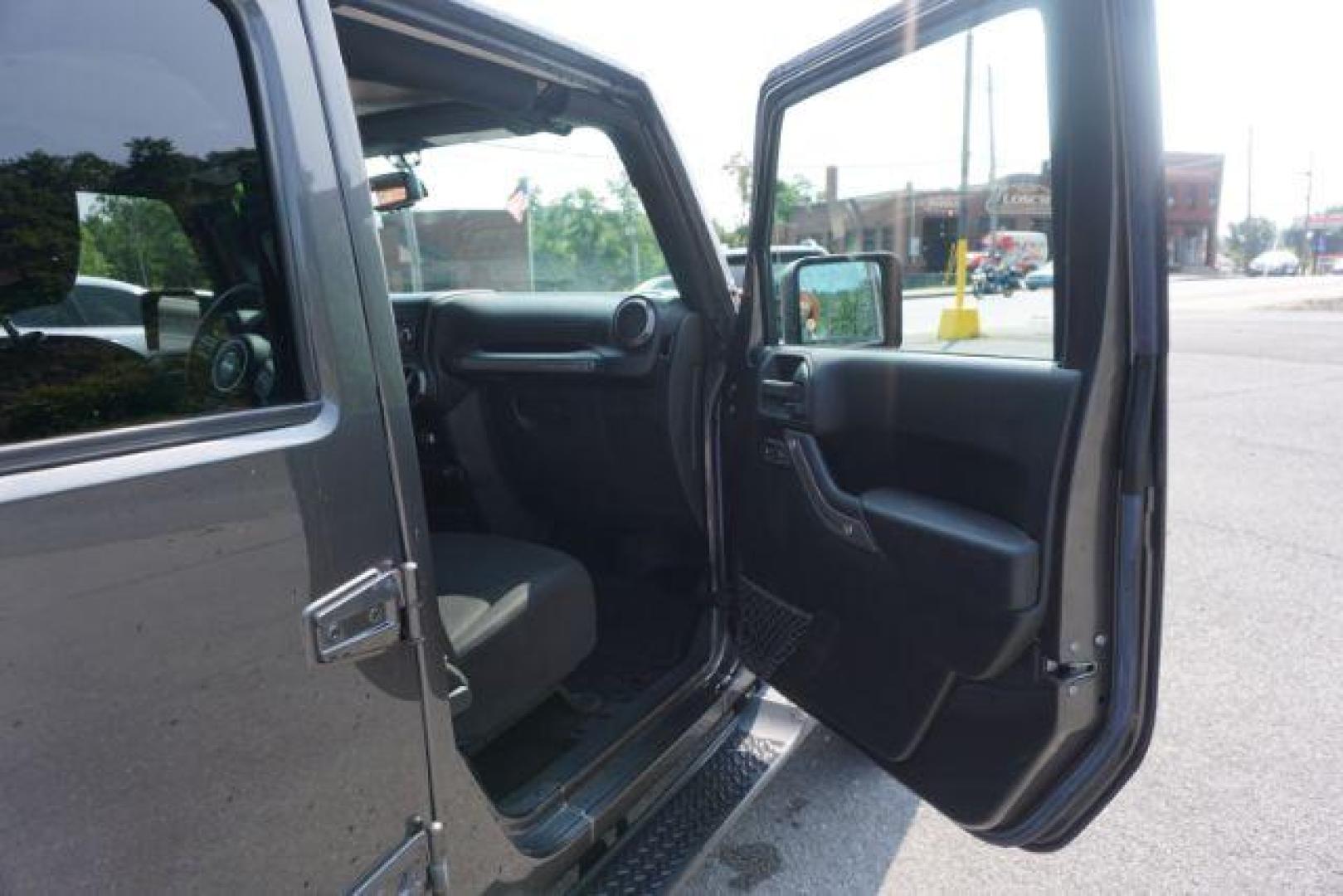 2016 Granite Crystal Metallic Clear Coat /Black, cloth Jeep Wrangler Unlimited Sport 4WD (1C4BJWDG5GL) with an 3.6L V6 DOHC 24V FFV engine, located at 312 Centre Ave, Schuylkill Haven, PA, 17972, (570) 593-5278, 40.638130, -76.177383 - Hard Top, Locking limited slip differential, Bluetooth connection - Photo#44