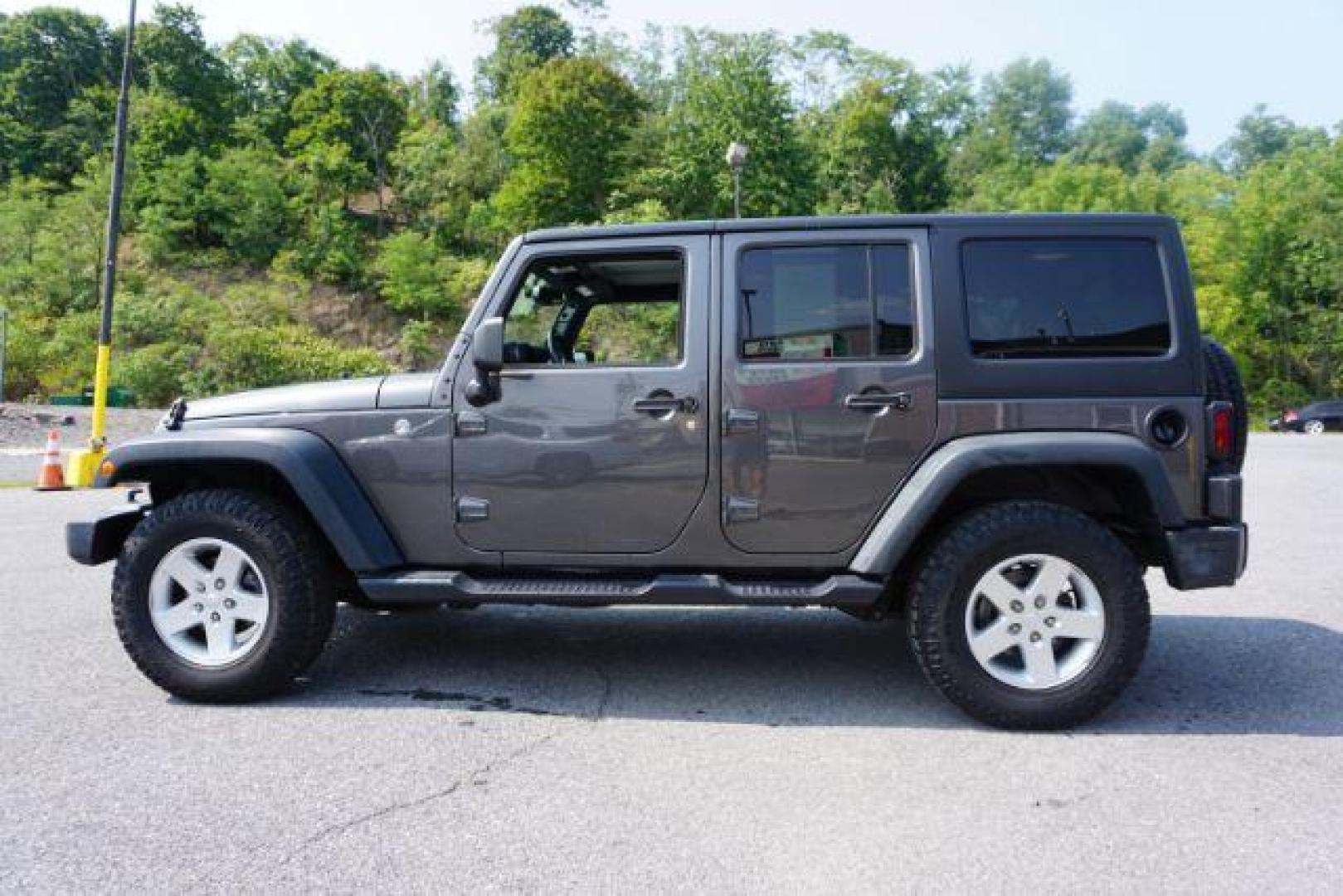 2016 Granite Crystal Metallic Clear Coat /Black, cloth Jeep Wrangler Unlimited Sport 4WD (1C4BJWDG5GL) with an 3.6L V6 DOHC 24V FFV engine, located at 312 Centre Ave, Schuylkill Haven, PA, 17972, (570) 593-5278, 40.638130, -76.177383 - Hard Top, Locking limited slip differential, Bluetooth connection - Photo#7