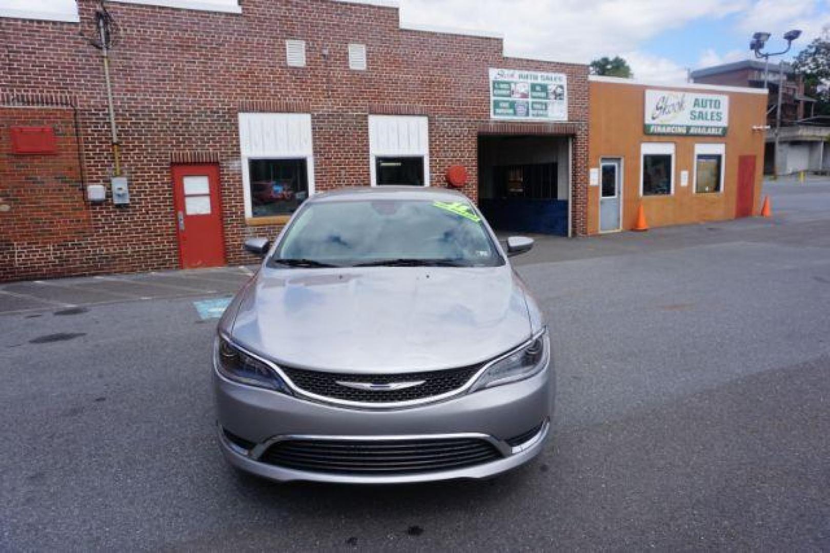 2015 Billet Silver Metallic CC Chrysler 200 Limited (1C3CCCABXFN) with an 2.4L L4 DOHC 16V engine, 9-Speed Automatic transmission, located at 312 Centre Ave, Schuylkill Haven, PA, 17972, (570) 593-5278, 40.638130, -76.177383 - Photo#4