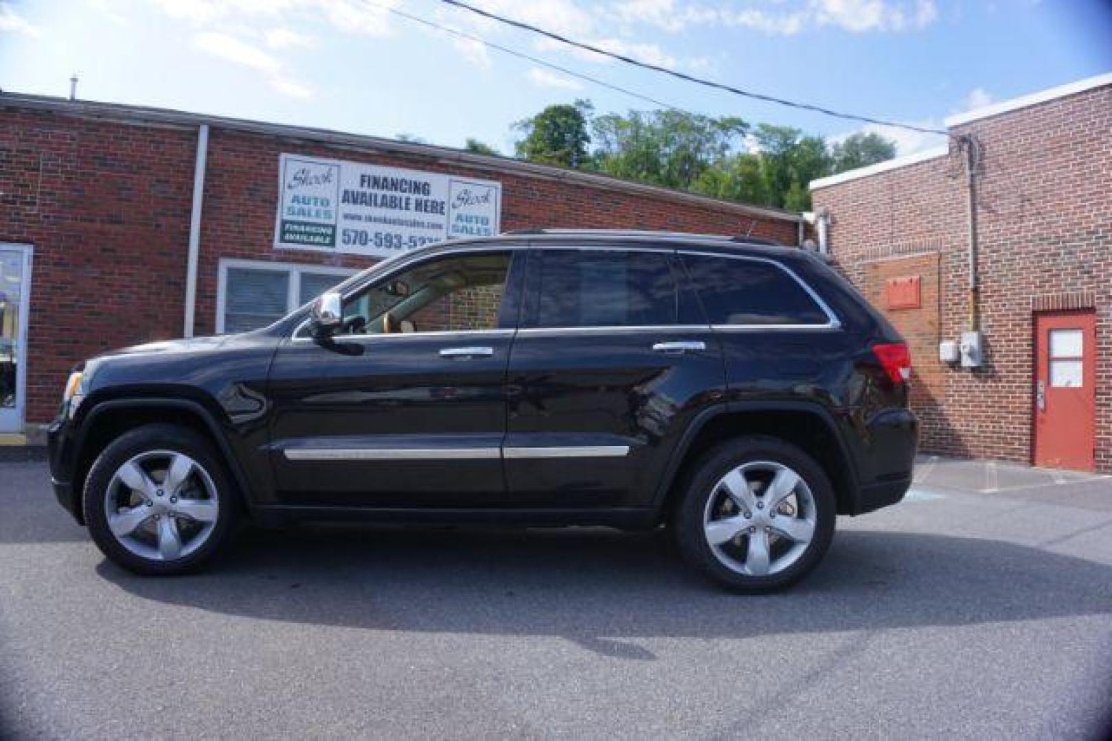 2013 Brilliant Black Crystal Pearl Jeep Grand Cherokee Overland 4WD (1C4RJFCG7DC) with an 3.6L V6 DOHC 24V engine, 5-Speed Automatic transmission, located at 312 Centre Ave, Schuylkill Haven, PA, 17972, (570) 593-5278, 40.638130, -76.177383 - blind spot monitor, collision avoidance system, rear parking sensors, towing pkg - Photo#0