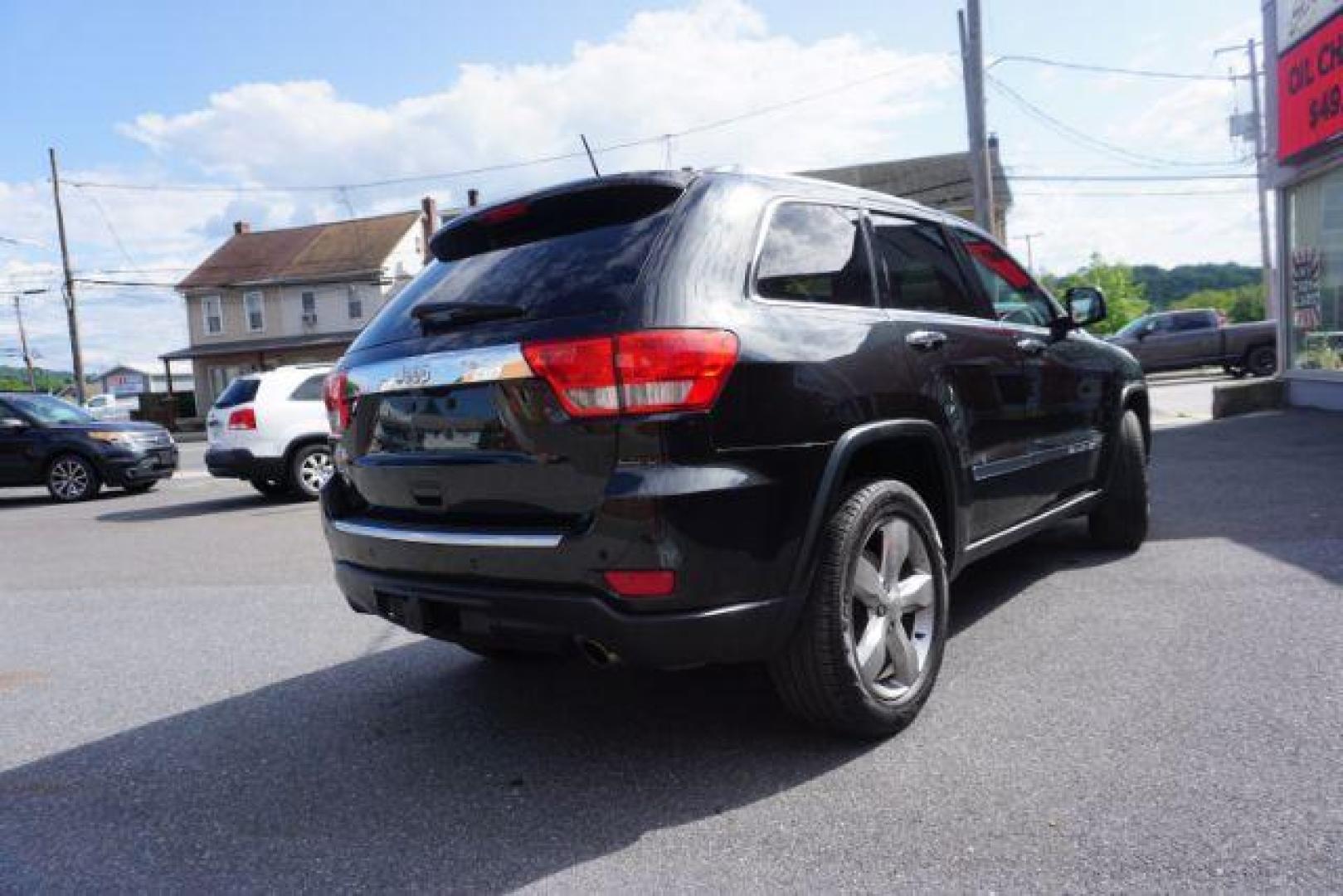 2013 Brilliant Black Crystal Pearl Jeep Grand Cherokee Overland 4WD (1C4RJFCG7DC) with an 3.6L V6 DOHC 24V engine, 5-Speed Automatic transmission, located at 312 Centre Ave, Schuylkill Haven, PA, 17972, (570) 593-5278, 40.638130, -76.177383 - blind spot monitor, collision avoidance system, rear parking sensors, towing pkg - Photo#11