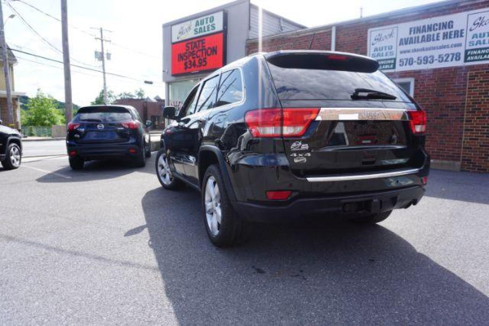 2013 Brilliant Black Crystal Pearl Jeep Grand Cherokee Overland 4WD (1C4RJFCG7DC) with an 3.6L V6 DOHC 24V engine, 5-Speed Automatic transmission, located at 312 Centre Ave, Schuylkill Haven, PA, 17972, (570) 593-5278, 40.638130, -76.177383 - blind spot monitor, collision avoidance system, rear parking sensors, towing pkg - Photo#14