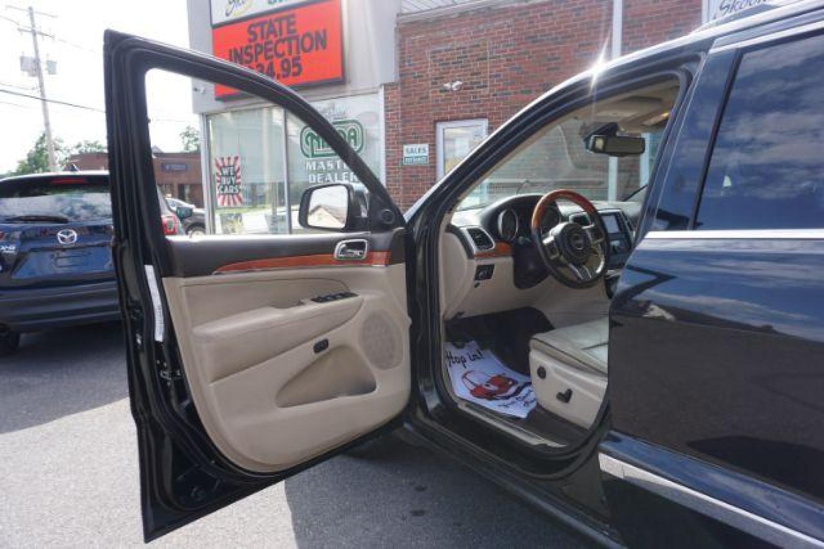 2013 Brilliant Black Crystal Pearl Jeep Grand Cherokee Overland 4WD (1C4RJFCG7DC) with an 3.6L V6 DOHC 24V engine, 5-Speed Automatic transmission, located at 312 Centre Ave, Schuylkill Haven, PA, 17972, (570) 593-5278, 40.638130, -76.177383 - blind spot monitor, collision avoidance system, rear parking sensors, towing pkg - Photo#17