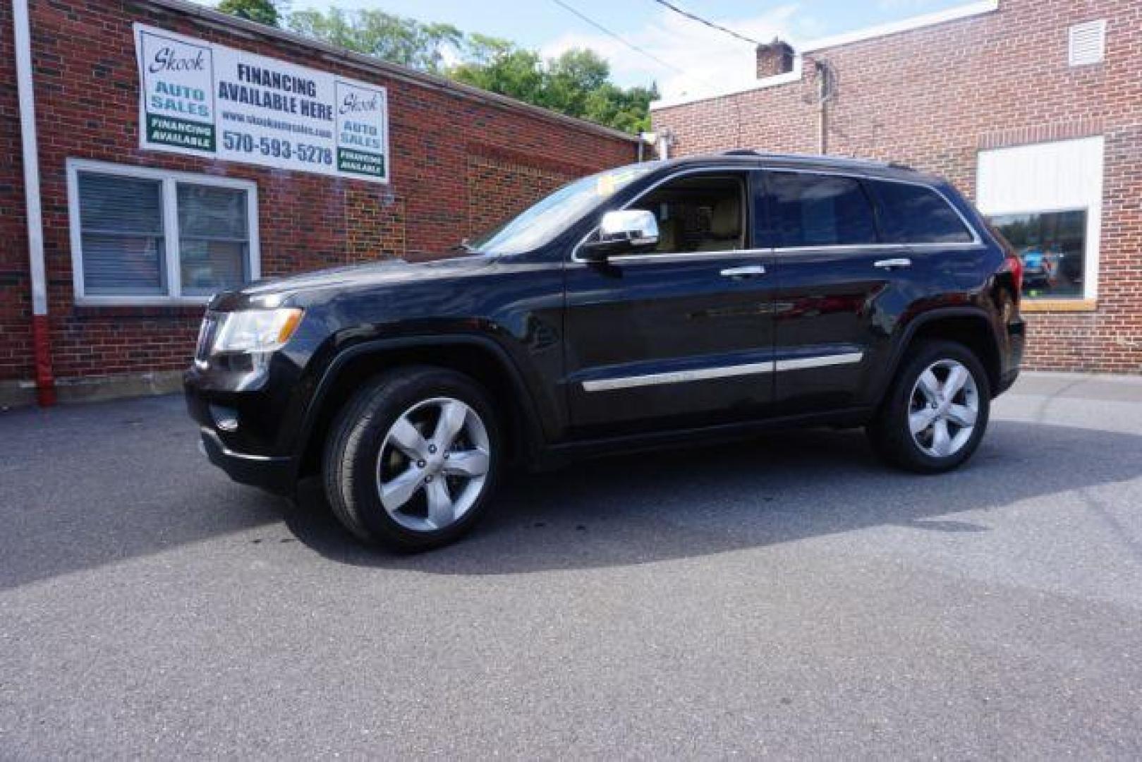 2013 Brilliant Black Crystal Pearl Jeep Grand Cherokee Overland 4WD (1C4RJFCG7DC) with an 3.6L V6 DOHC 24V engine, 5-Speed Automatic transmission, located at 312 Centre Ave, Schuylkill Haven, PA, 17972, (570) 593-5278, 40.638130, -76.177383 - blind spot monitor, collision avoidance system, rear parking sensors, towing pkg - Photo#1