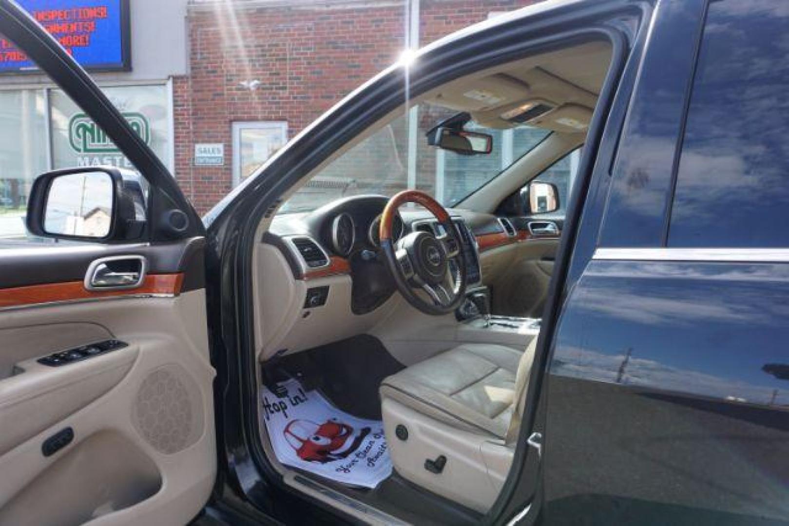 2013 Brilliant Black Crystal Pearl Jeep Grand Cherokee Overland 4WD (1C4RJFCG7DC) with an 3.6L V6 DOHC 24V engine, 5-Speed Automatic transmission, located at 312 Centre Ave, Schuylkill Haven, PA, 17972, (570) 593-5278, 40.638130, -76.177383 - blind spot monitor, collision avoidance system, rear parking sensors, towing pkg - Photo#19