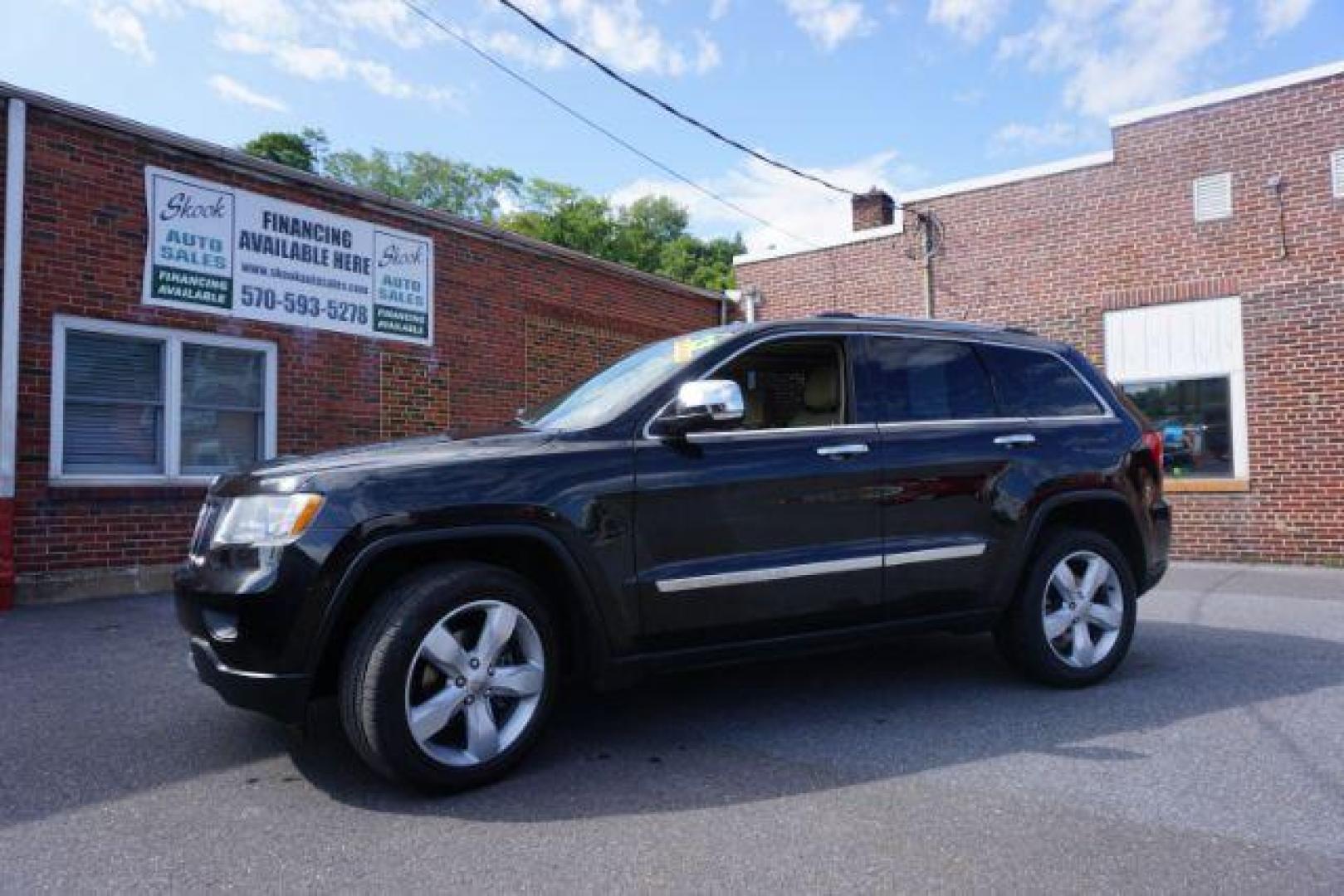 2013 Brilliant Black Crystal Pearl Jeep Grand Cherokee Overland 4WD (1C4RJFCG7DC) with an 3.6L V6 DOHC 24V engine, 5-Speed Automatic transmission, located at 312 Centre Ave, Schuylkill Haven, PA, 17972, (570) 593-5278, 40.638130, -76.177383 - blind spot monitor, collision avoidance system, rear parking sensors, towing pkg - Photo#2