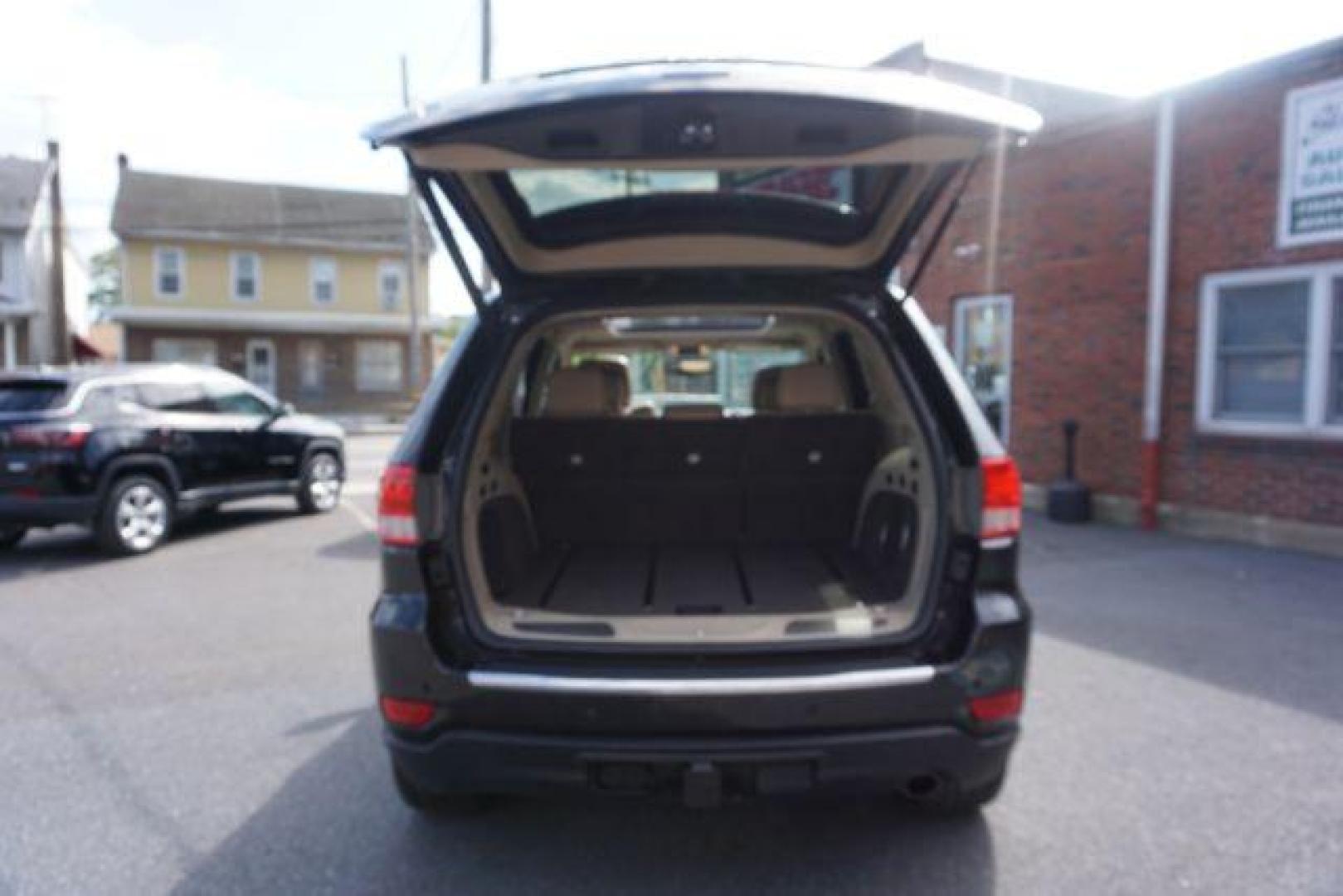 2013 Brilliant Black Crystal Pearl Jeep Grand Cherokee Overland 4WD (1C4RJFCG7DC) with an 3.6L V6 DOHC 24V engine, 5-Speed Automatic transmission, located at 312 Centre Ave, Schuylkill Haven, PA, 17972, (570) 593-5278, 40.638130, -76.177383 - blind spot monitor, collision avoidance system, rear parking sensors, towing pkg - Photo#43