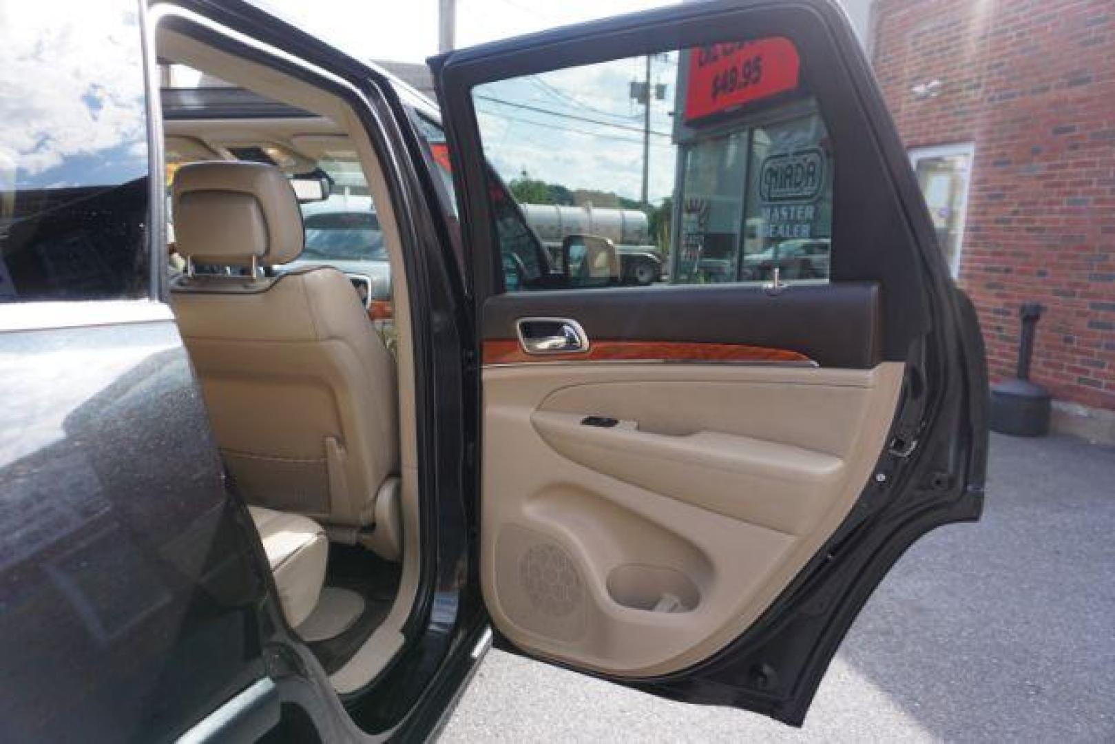 2013 Brilliant Black Crystal Pearl Jeep Grand Cherokee Overland 4WD (1C4RJFCG7DC) with an 3.6L V6 DOHC 24V engine, 5-Speed Automatic transmission, located at 312 Centre Ave, Schuylkill Haven, PA, 17972, (570) 593-5278, 40.638130, -76.177383 - blind spot monitor, collision avoidance system, rear parking sensors, towing pkg - Photo#45