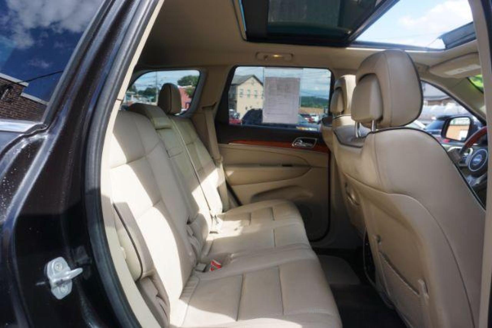 2013 Brilliant Black Crystal Pearl Jeep Grand Cherokee Overland 4WD (1C4RJFCG7DC) with an 3.6L V6 DOHC 24V engine, 5-Speed Automatic transmission, located at 312 Centre Ave, Schuylkill Haven, PA, 17972, (570) 593-5278, 40.638130, -76.177383 - blind spot monitor, collision avoidance system, rear parking sensors, towing pkg - Photo#48