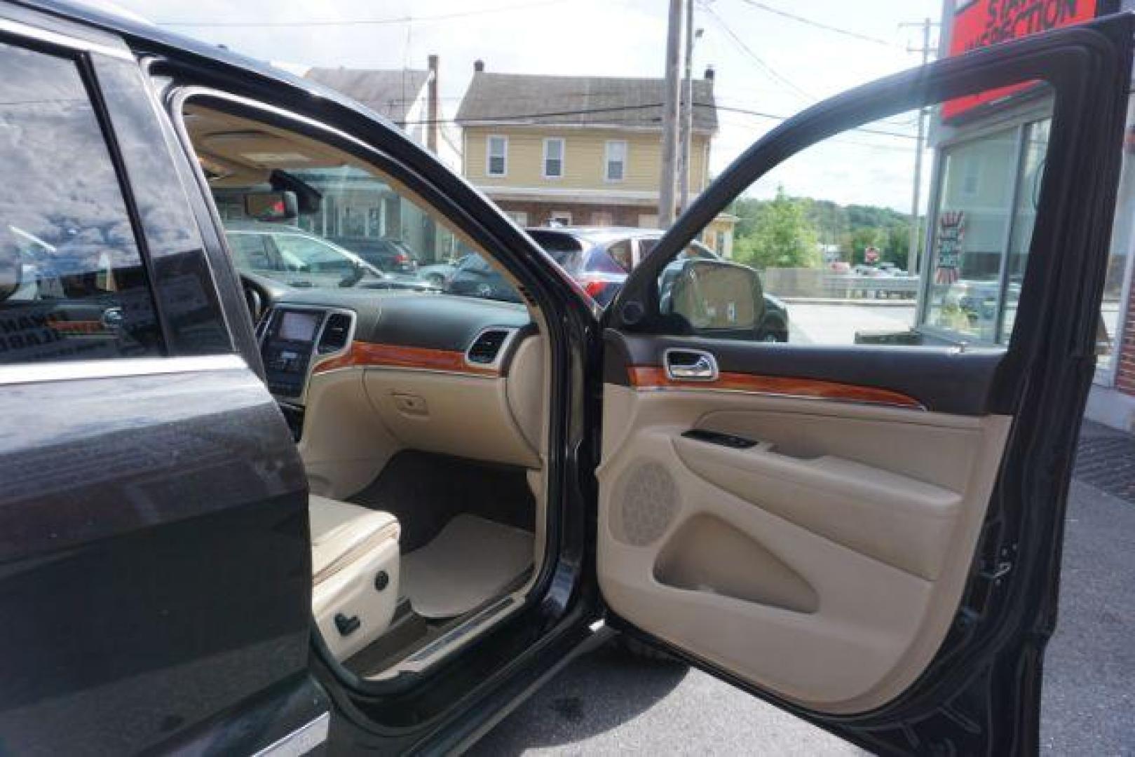 2013 Brilliant Black Crystal Pearl Jeep Grand Cherokee Overland 4WD (1C4RJFCG7DC) with an 3.6L V6 DOHC 24V engine, 5-Speed Automatic transmission, located at 312 Centre Ave, Schuylkill Haven, PA, 17972, (570) 593-5278, 40.638130, -76.177383 - blind spot monitor, collision avoidance system, rear parking sensors, towing pkg - Photo#49