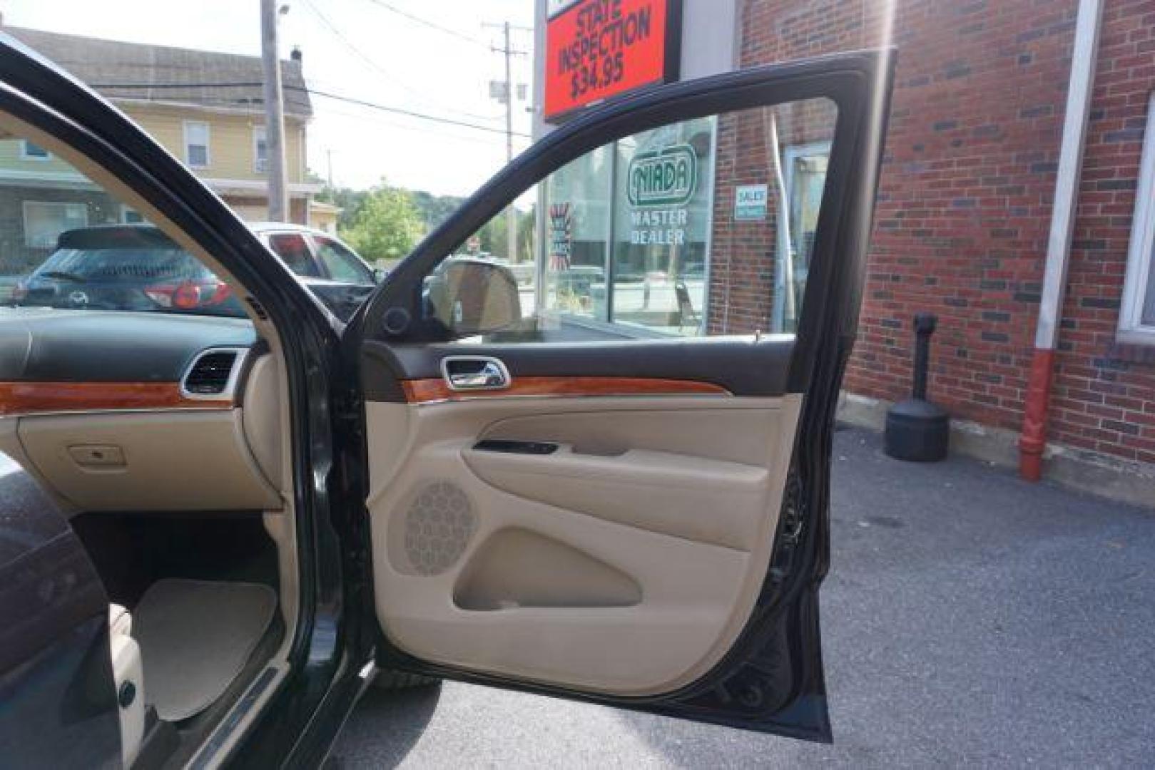 2013 Brilliant Black Crystal Pearl Jeep Grand Cherokee Overland 4WD (1C4RJFCG7DC) with an 3.6L V6 DOHC 24V engine, 5-Speed Automatic transmission, located at 312 Centre Ave, Schuylkill Haven, PA, 17972, (570) 593-5278, 40.638130, -76.177383 - blind spot monitor, collision avoidance system, rear parking sensors, towing pkg - Photo#50