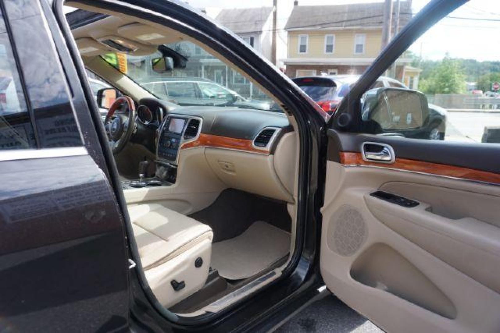 2013 Brilliant Black Crystal Pearl Jeep Grand Cherokee Overland 4WD (1C4RJFCG7DC) with an 3.6L V6 DOHC 24V engine, 5-Speed Automatic transmission, located at 312 Centre Ave, Schuylkill Haven, PA, 17972, (570) 593-5278, 40.638130, -76.177383 - blind spot monitor, collision avoidance system, rear parking sensors, towing pkg - Photo#51