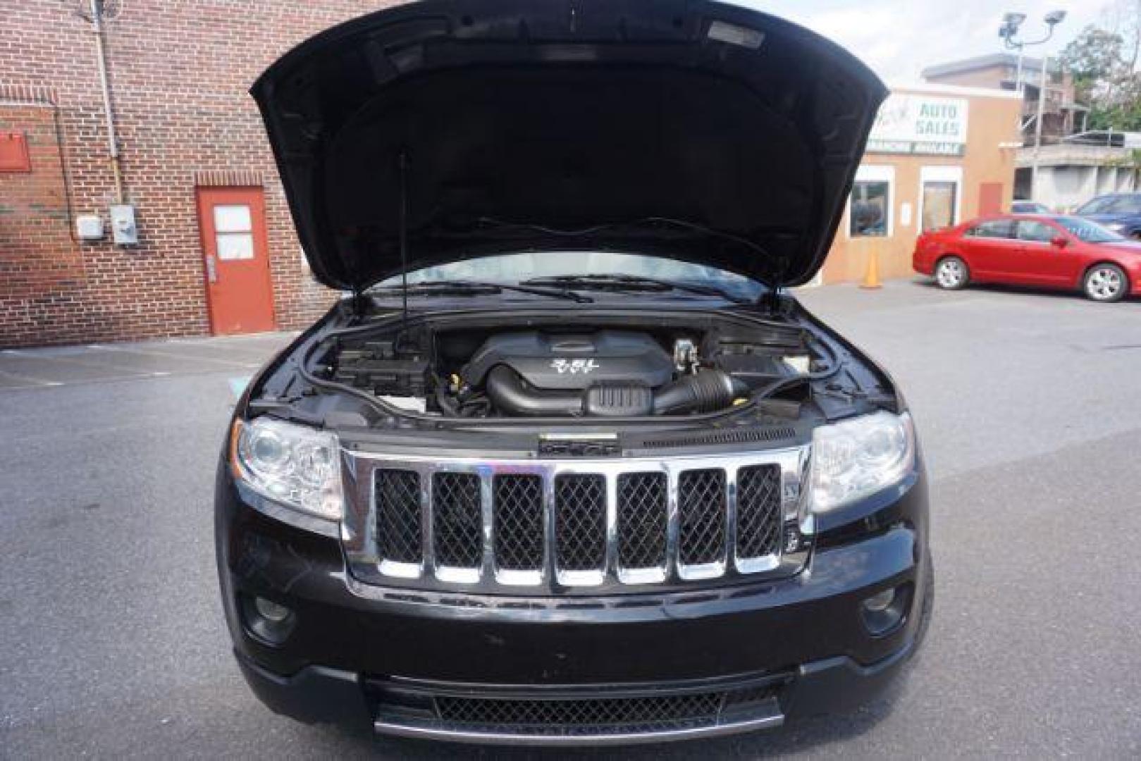 2013 Brilliant Black Crystal Pearl Jeep Grand Cherokee Overland 4WD (1C4RJFCG7DC) with an 3.6L V6 DOHC 24V engine, 5-Speed Automatic transmission, located at 312 Centre Ave, Schuylkill Haven, PA, 17972, (570) 593-5278, 40.638130, -76.177383 - blind spot monitor, collision avoidance system, rear parking sensors, towing pkg - Photo#56