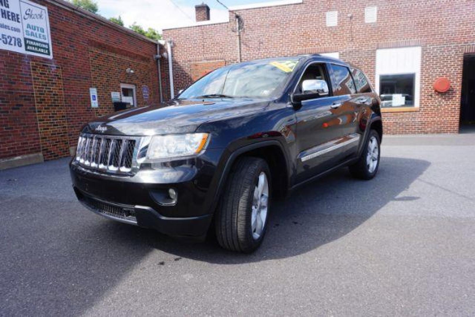 2013 Brilliant Black Crystal Pearl Jeep Grand Cherokee Overland 4WD (1C4RJFCG7DC) with an 3.6L V6 DOHC 24V engine, 5-Speed Automatic transmission, located at 312 Centre Ave, Schuylkill Haven, PA, 17972, (570) 593-5278, 40.638130, -76.177383 - blind spot monitor, collision avoidance system, rear parking sensors, towing pkg - Photo#5